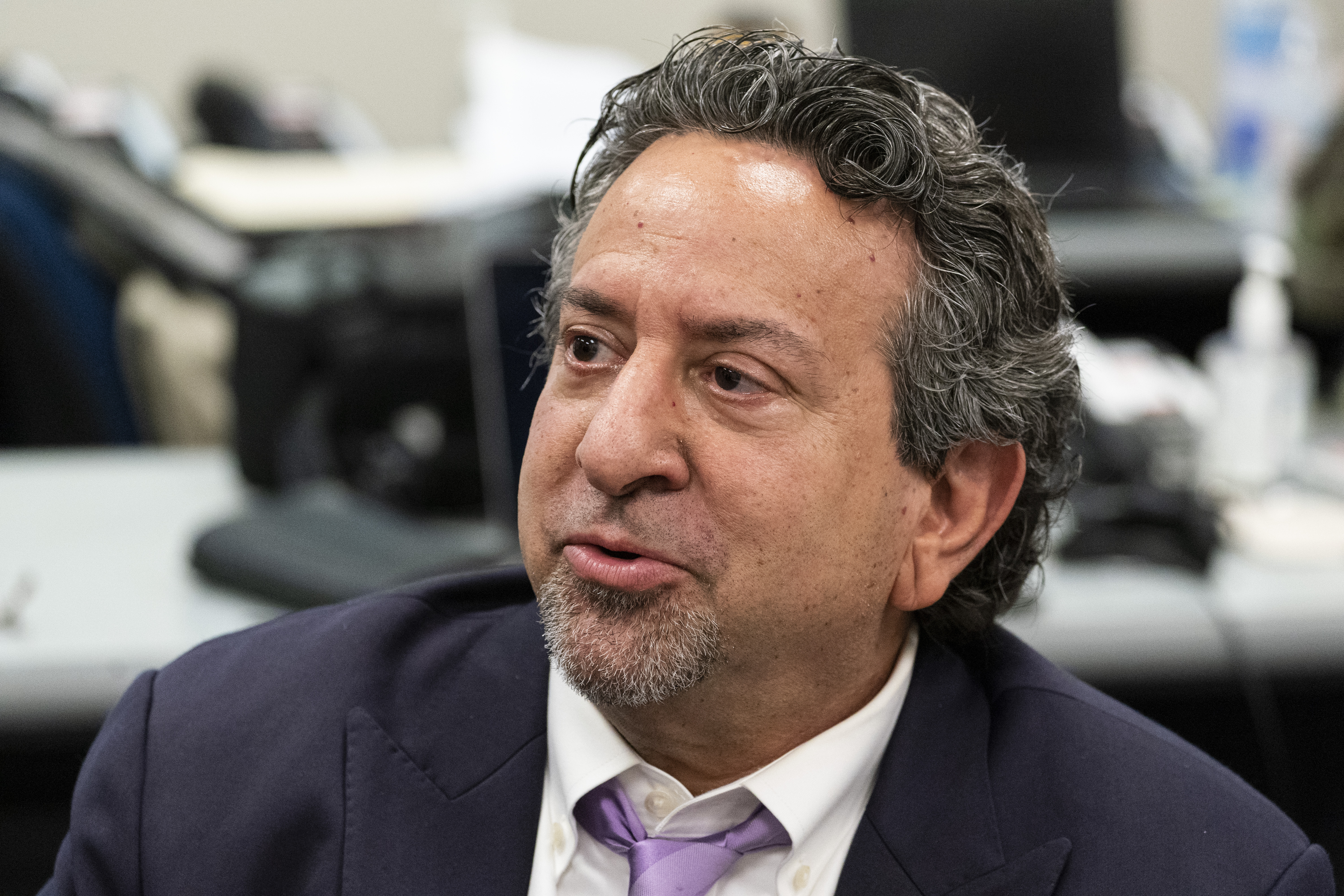 James Hodes, who leads Hambali's defence team. He's wearing a suit and tie and sitting in an office.