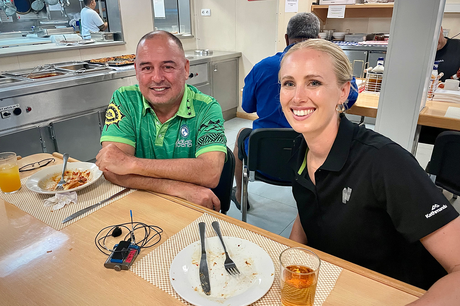 Cook Islands Prime Minister Mark Brown sits with reporter Lucy Murray