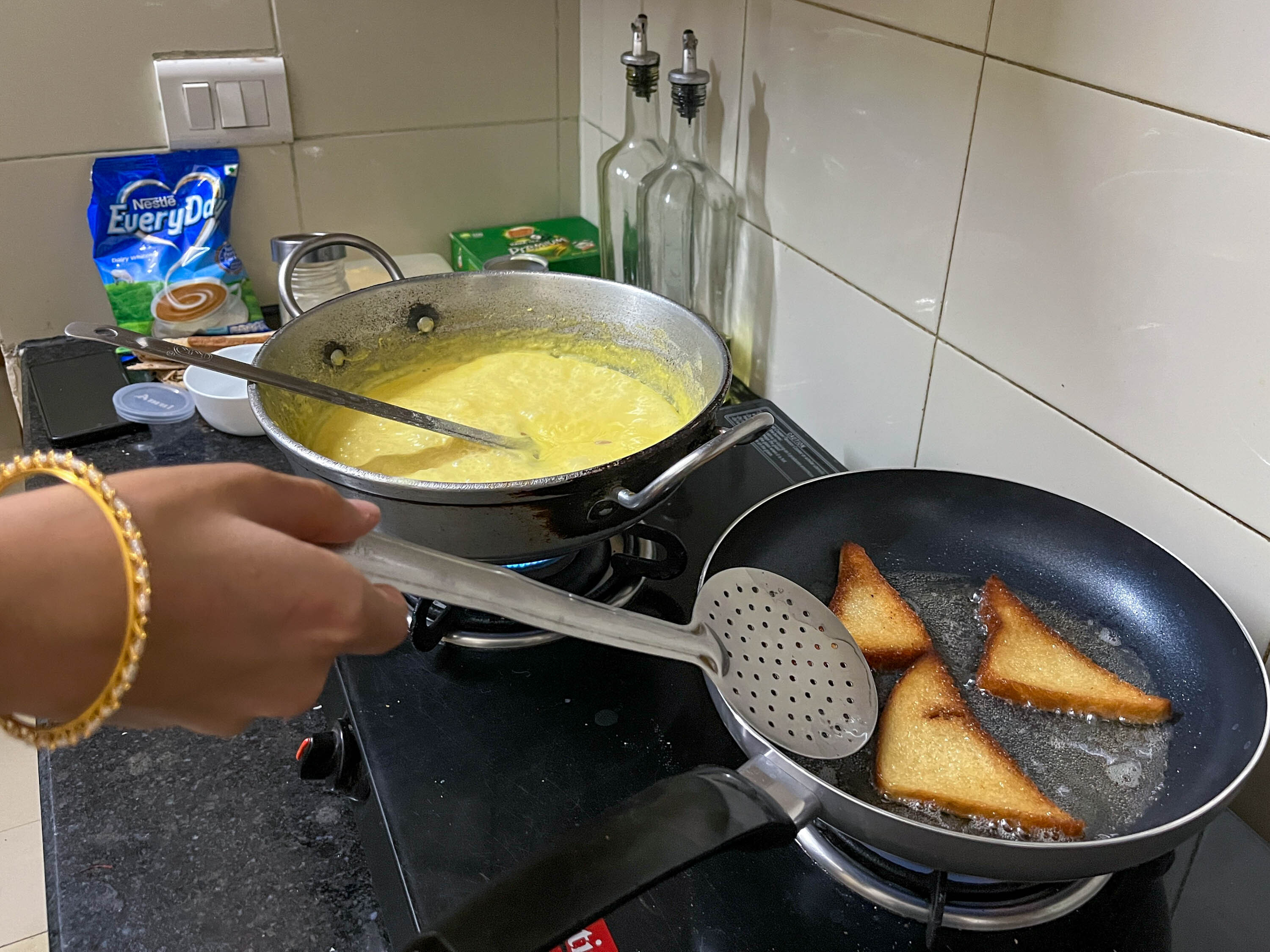 Bread frying in preparation for making shahi tukda