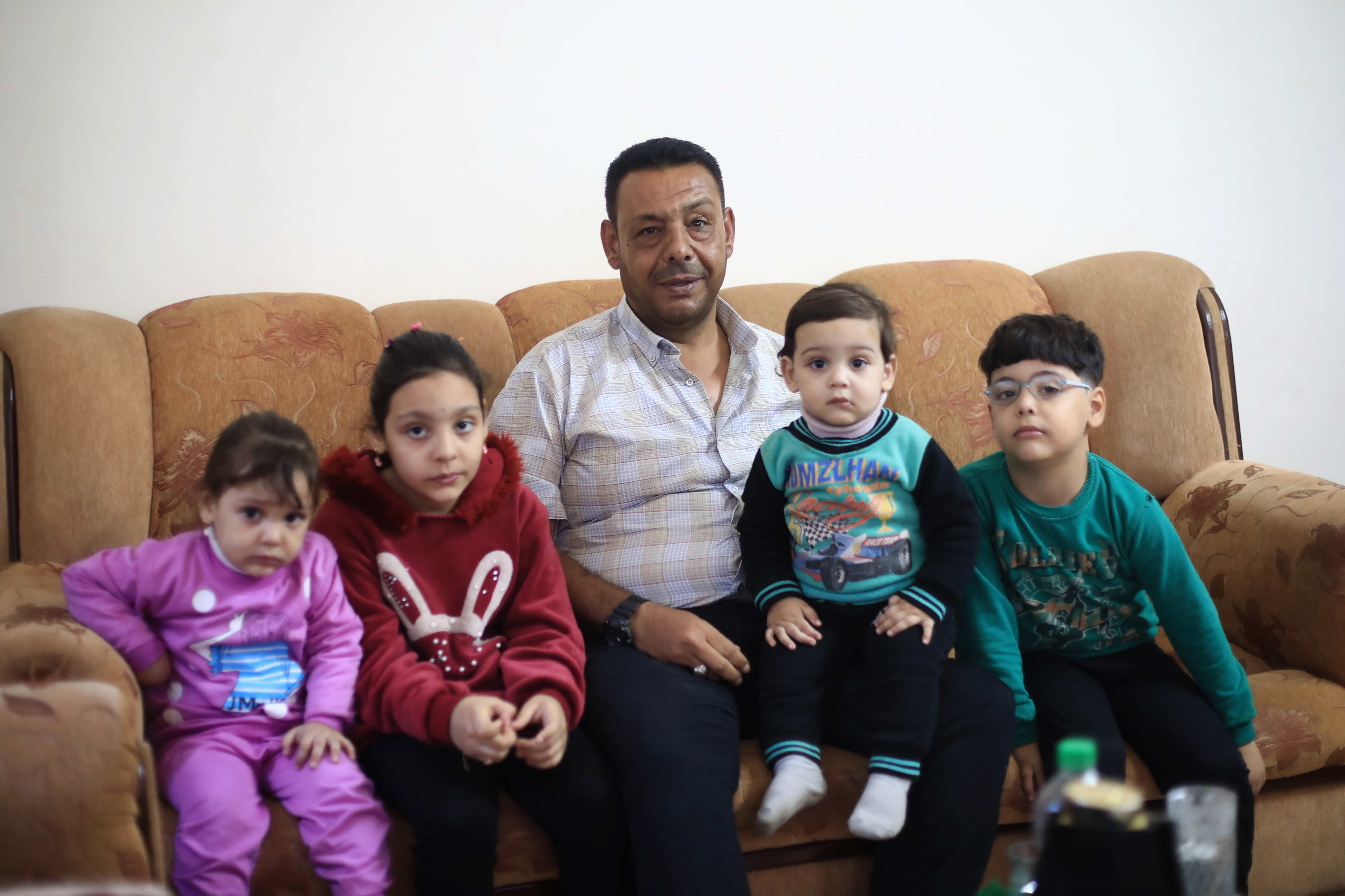 A man with his children