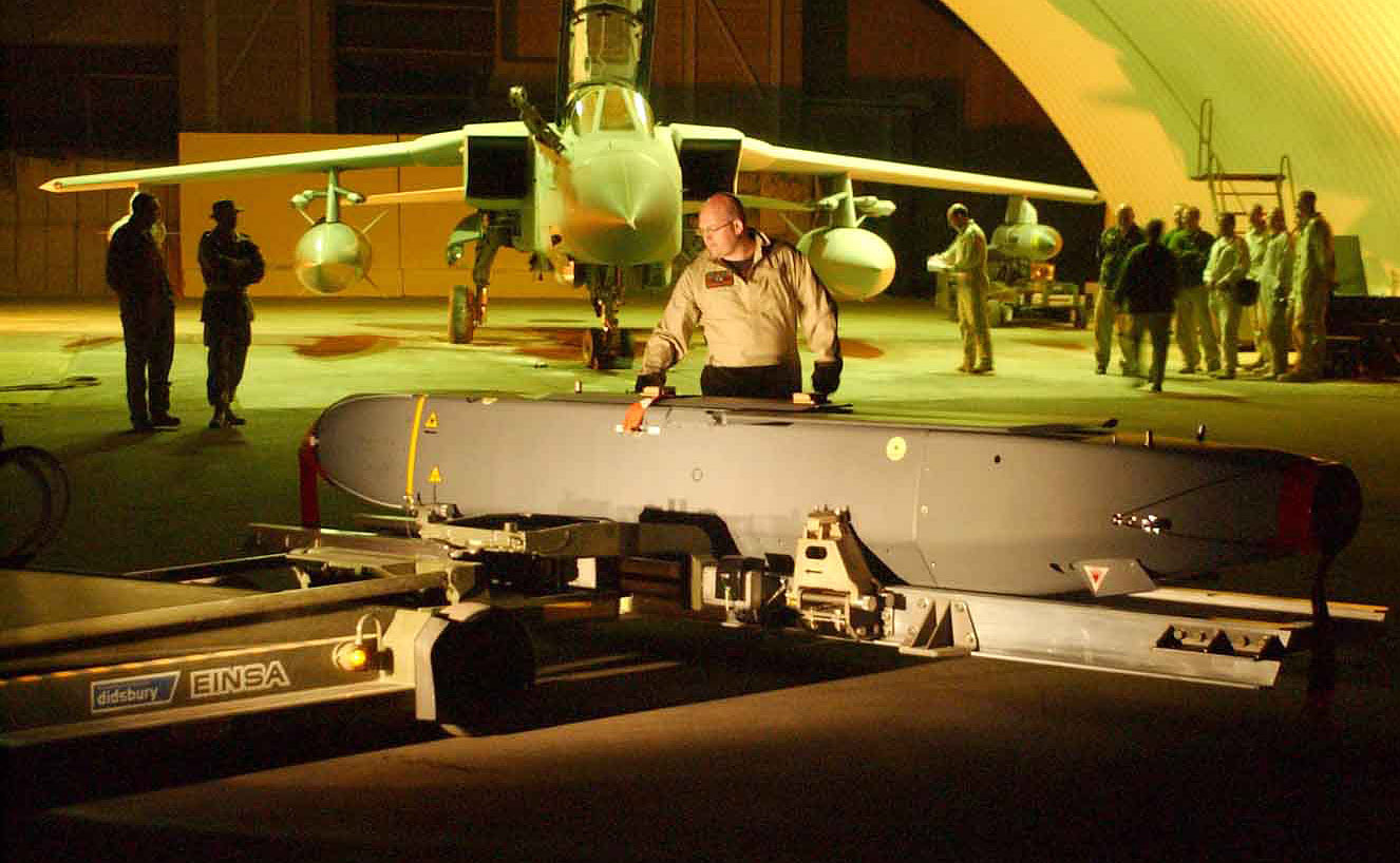 A Storm Shadow missile is prepared for loading to a Royal Air Force Tornado GR4 aircraft in the Gulf in support of Operation TELIC, March 21, 2003. Storm Shadow is an air launched cruise missile designed to hit highly protected targets from extended range. Washington's chief ally Britain refused to be drawn on March 22, 2003 over a timetable for the length of the war in Iraq as UK forces battled alongside U.S. soldiers to take the southern city of Basra. EDITORIAL USE ONLY. REUTERS/HO/Cpl Mark Bailey RAF ASA
