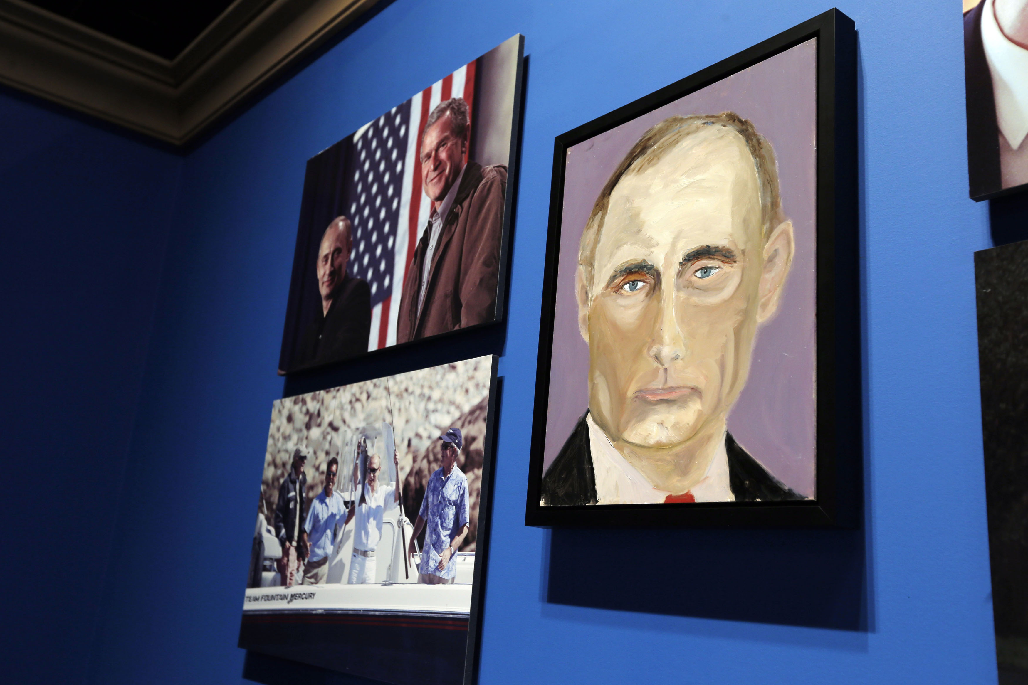 A portrait of Russian President Vladimir Putin, painted by former US President George W Bush, is displayed at "The Art of Leadership: A President's Personal Diplomacy" exhibit at the Bush Presidential Library and Museum in Dallas, Texas April 4, 2014.