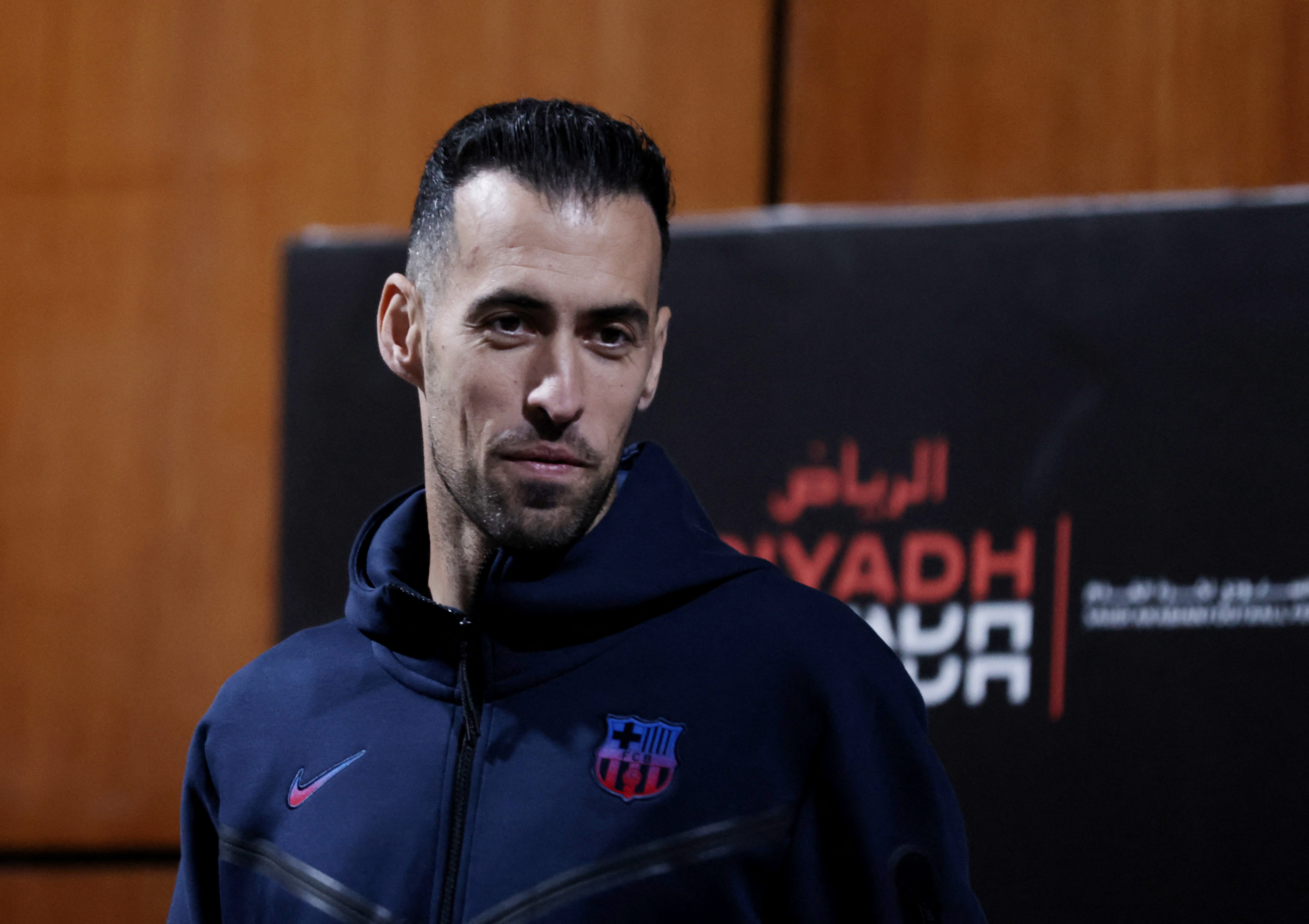 Busquets at a press conference