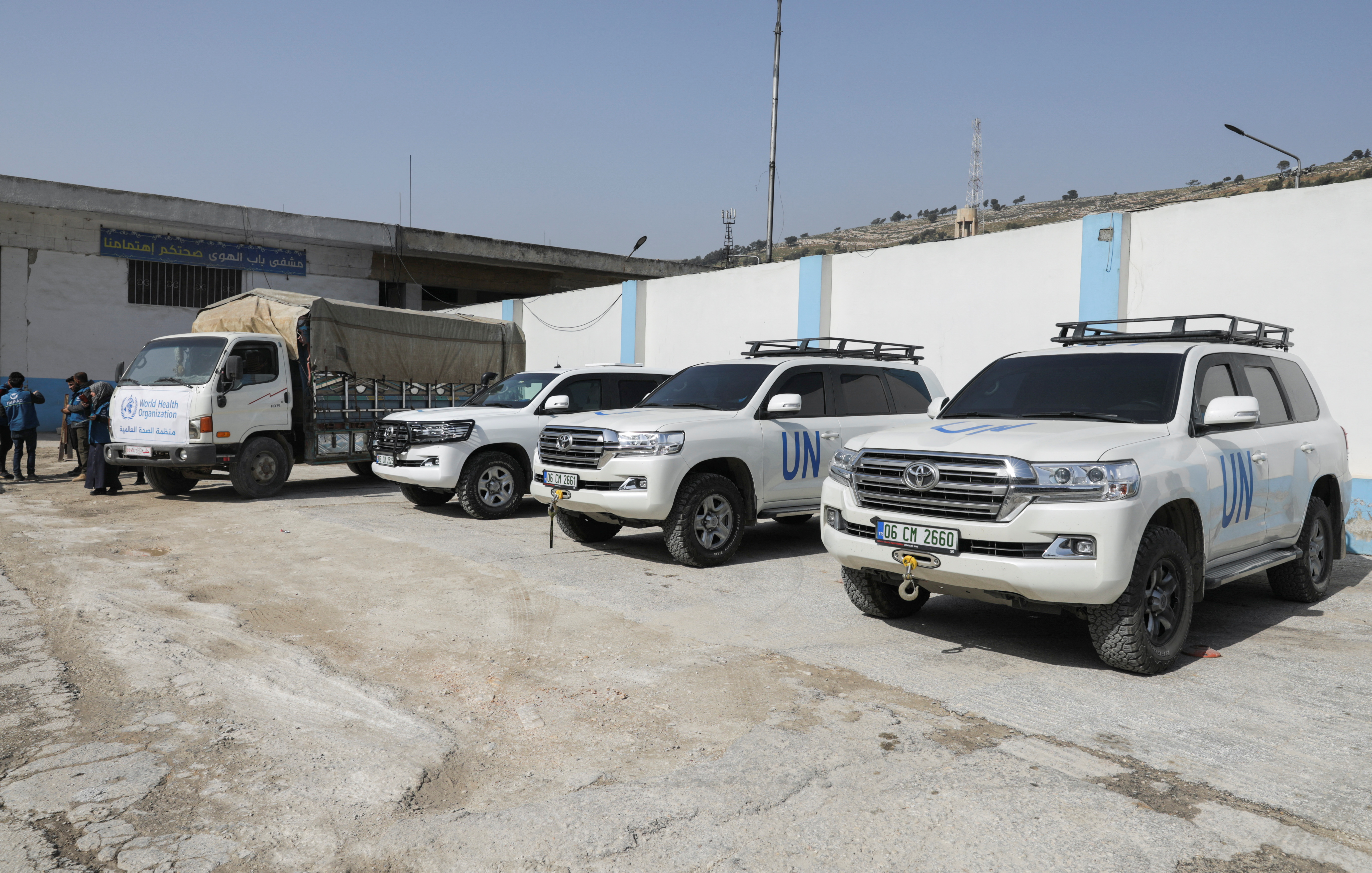 U.N. vehicles park outside a hospital supported by Syrian American Medical Society (SAMS)