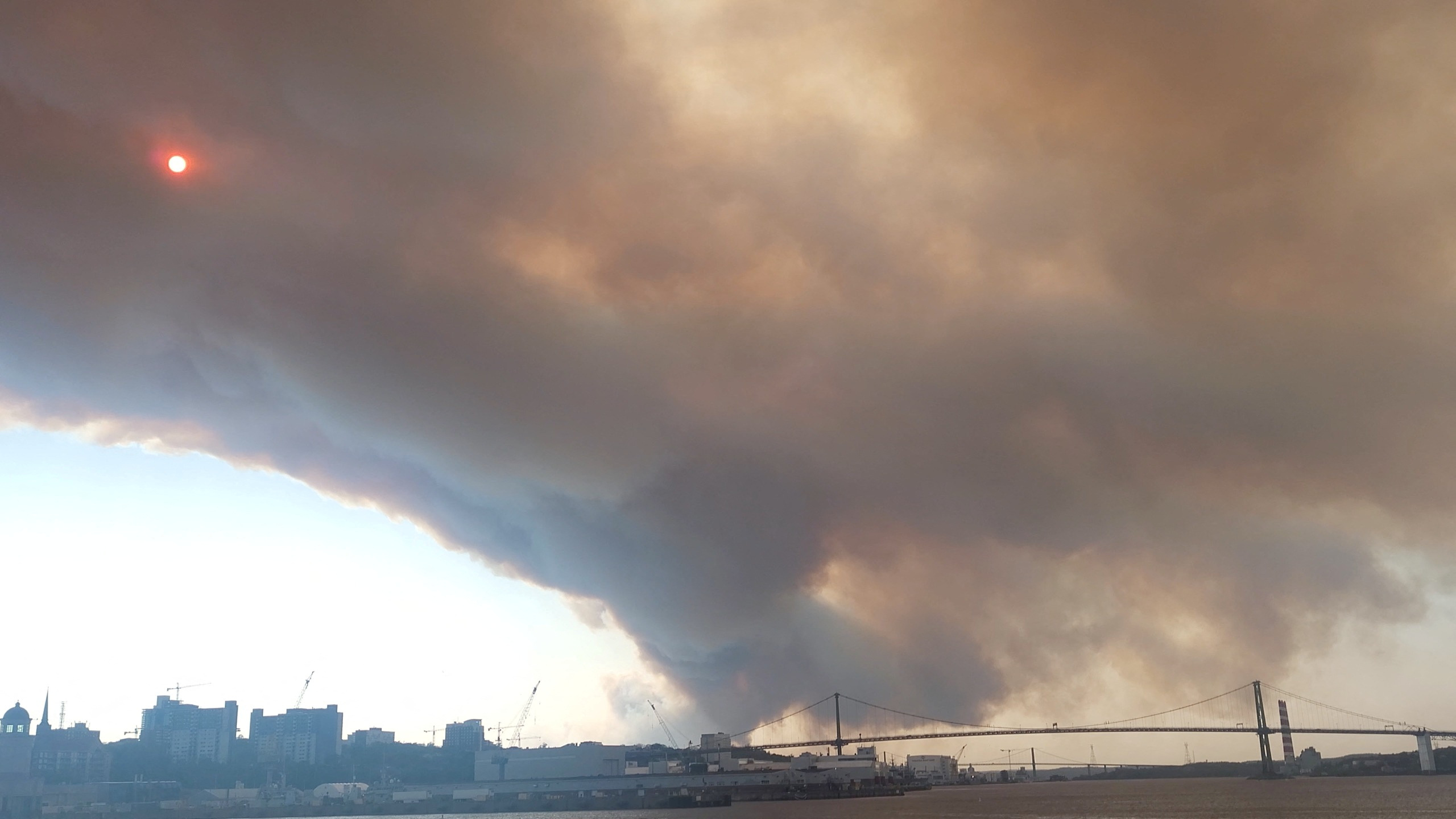 Smoke rises from a wildfire in Halifax, Nova Scotia, Canada