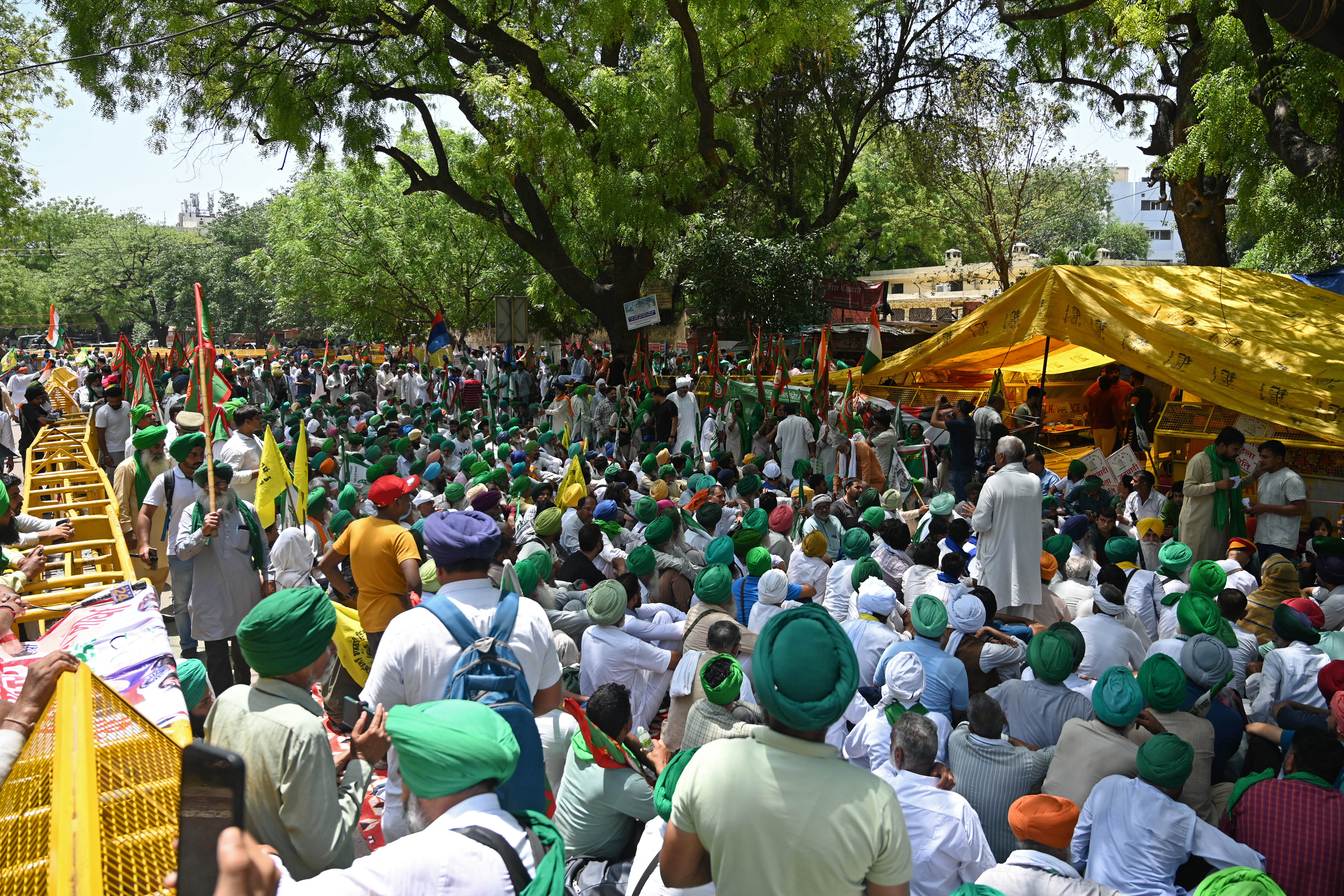 Farmers gather at the site of an ongoing protest by Indian wrestlers in New Delhi