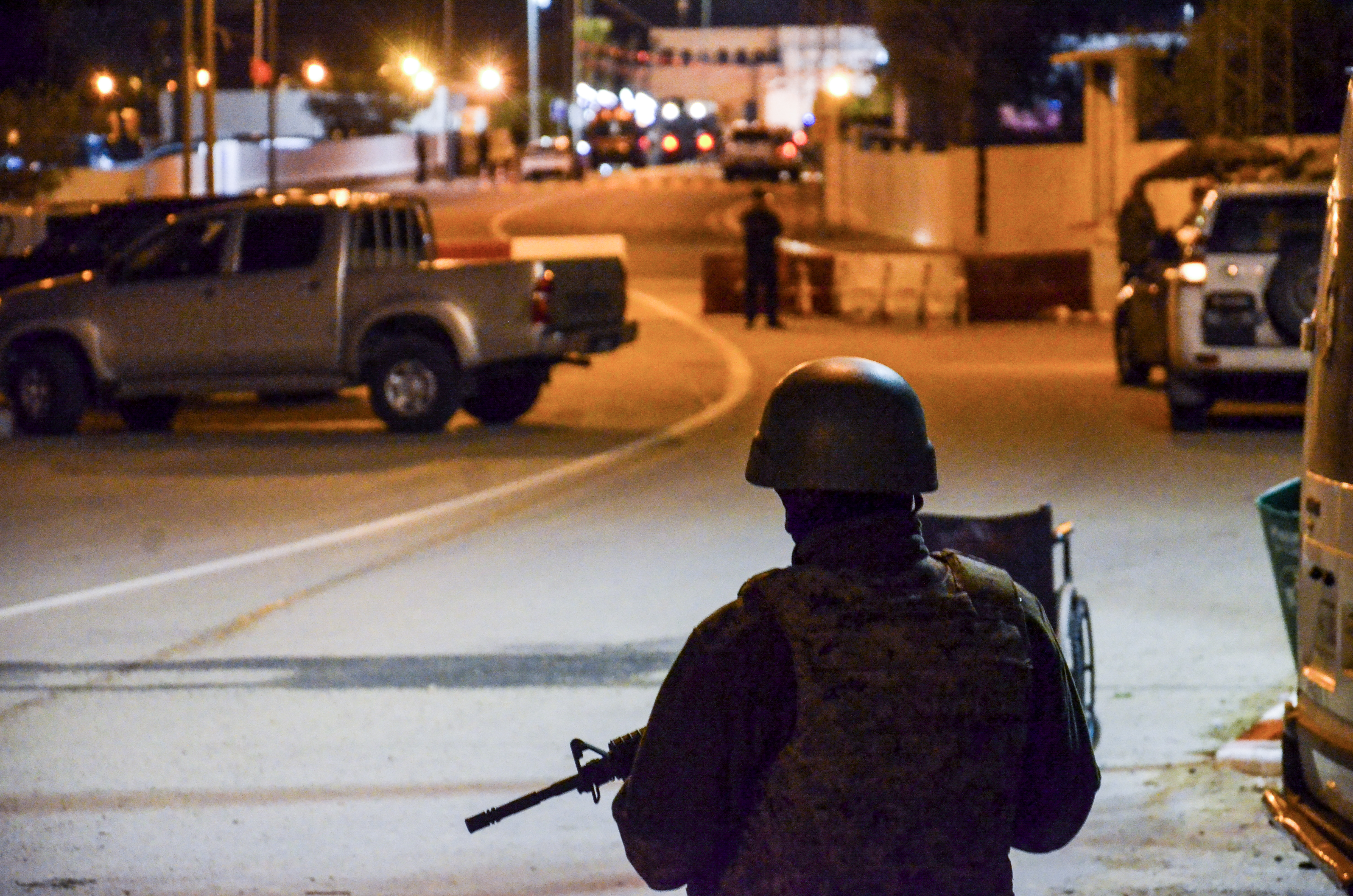 police secure an area near the Ghriba synagogue following a shootout on the resort island of Djerba.