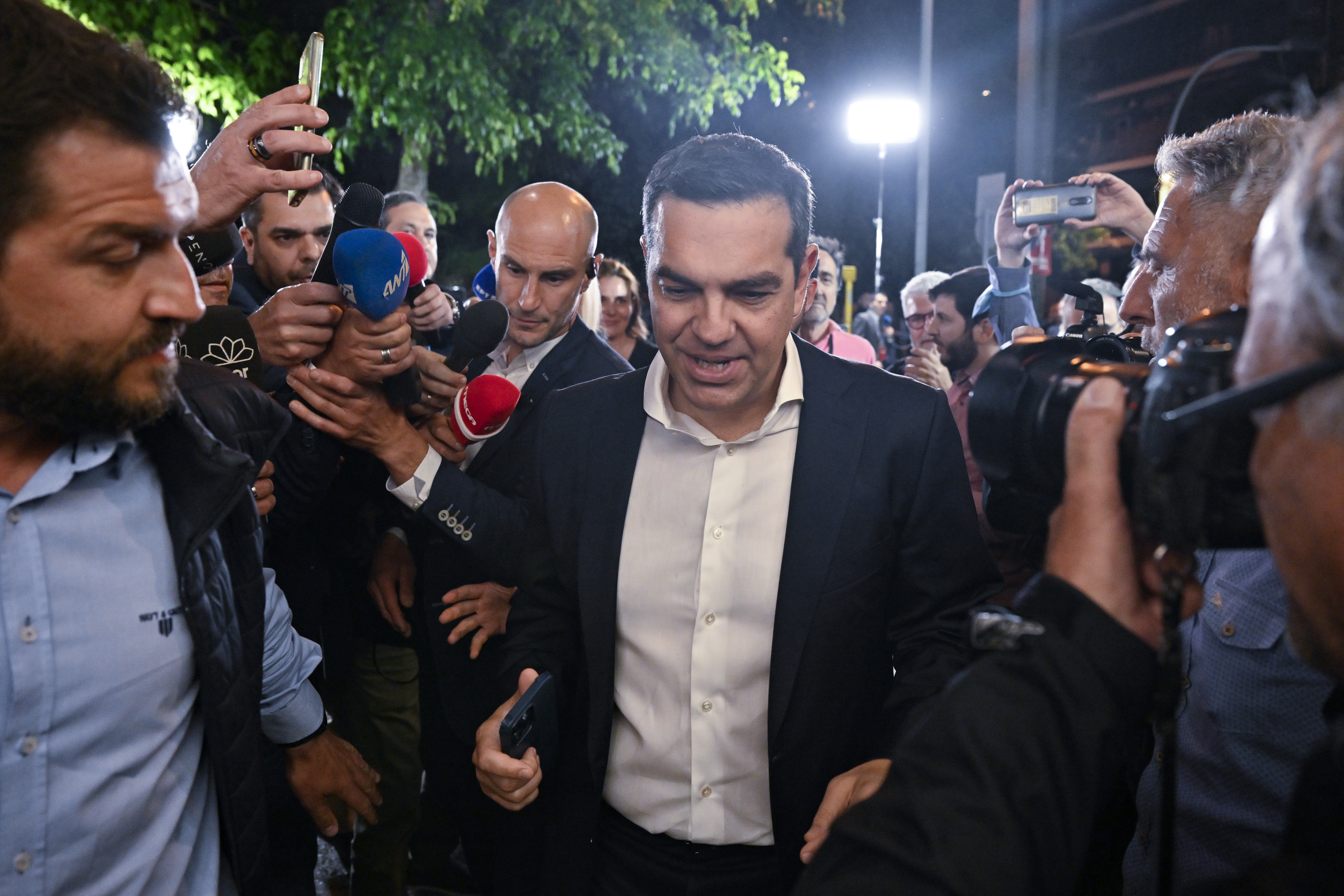 Alexis Tsipras, former premier and leader of the leftist coalition Syriza, arrives at the party headquarters in Athens, on May 21, 2023 [AFP/Louisa Gouliamaki]