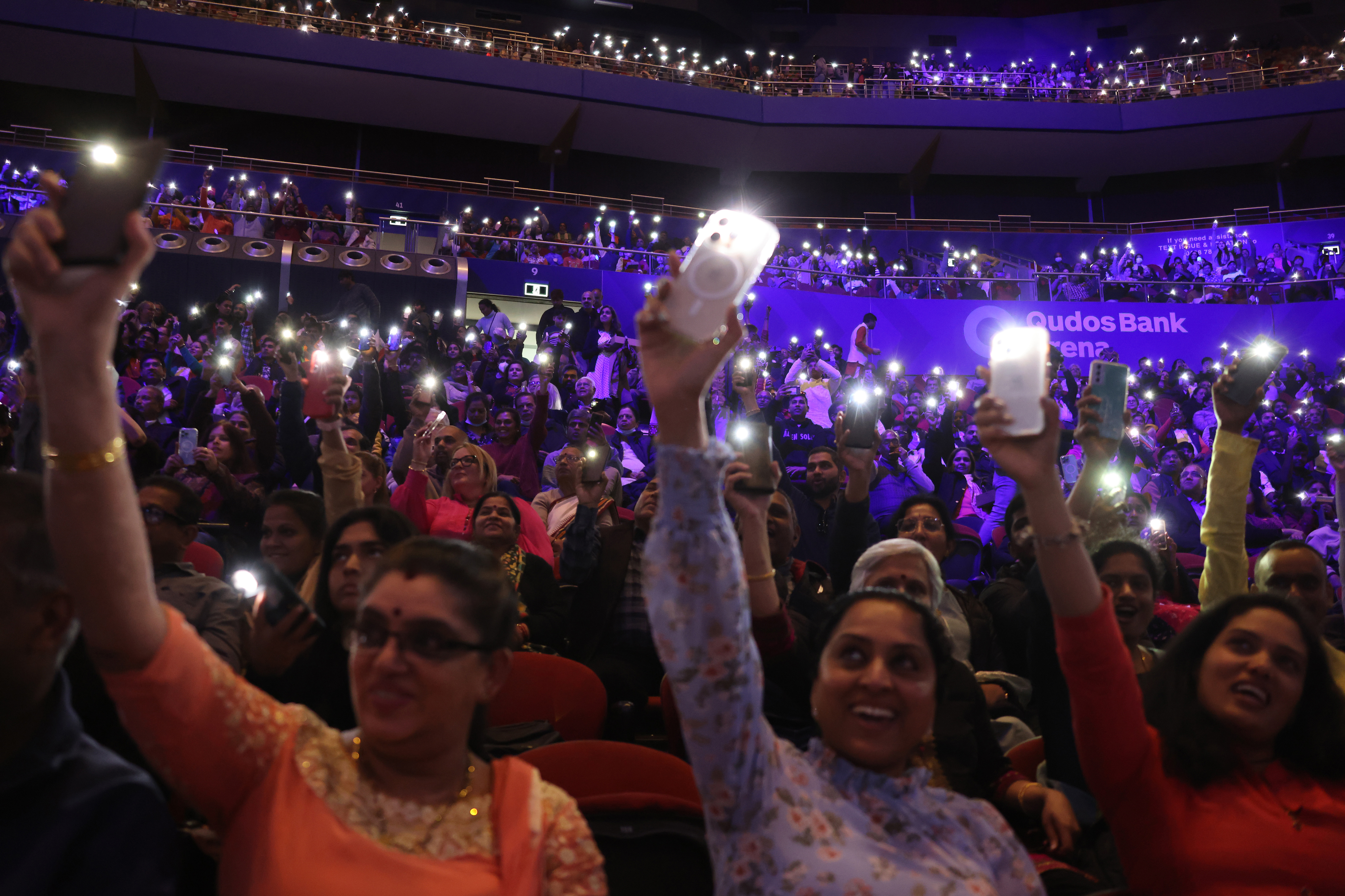 Members of the local Indian community welcome Australias Prime Minister Anthony Albanese and India's Prime Minister Narendra Modi during an event at the Qudos Arena in Sydney on May 23