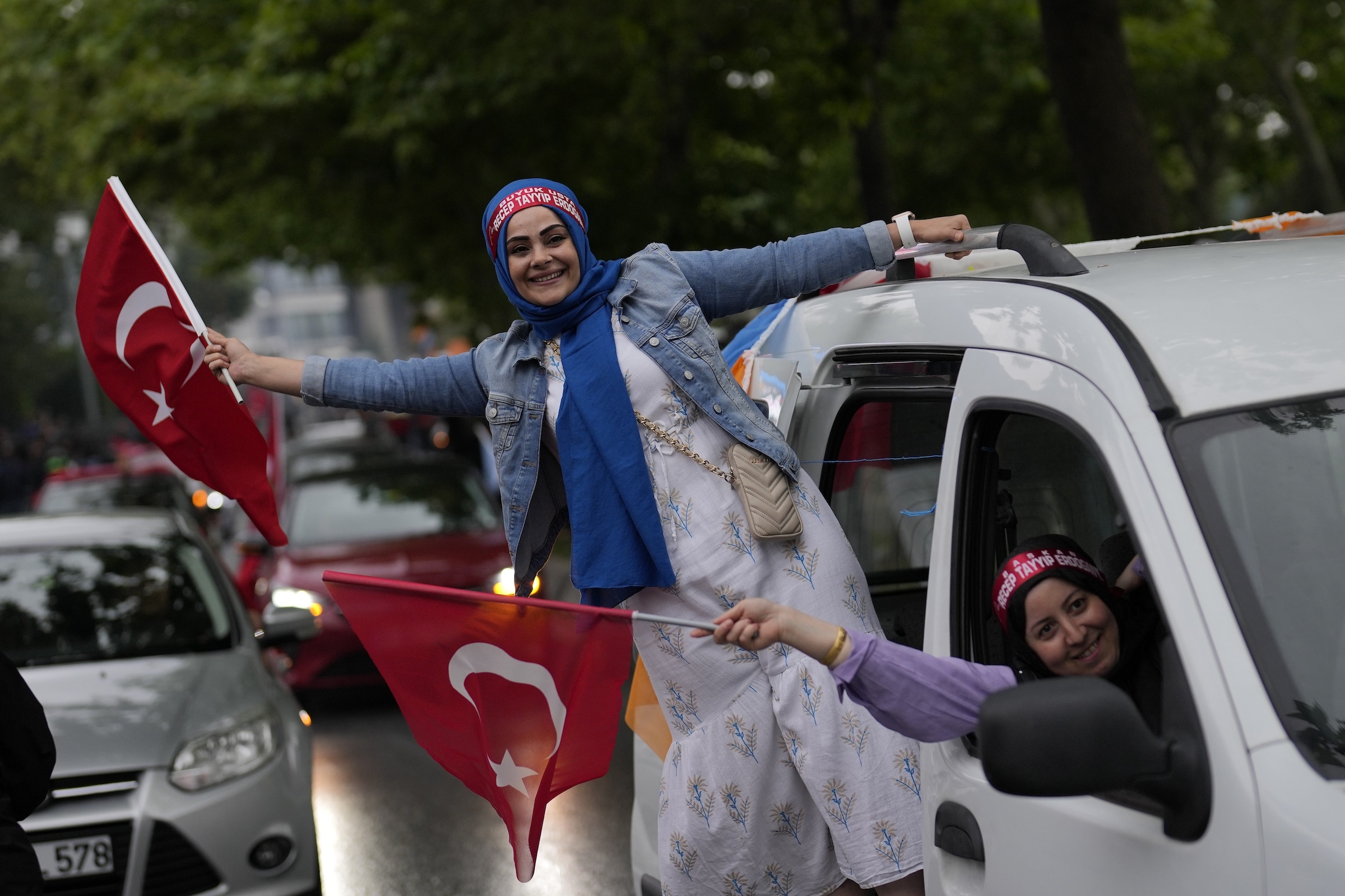 Supporters of the Turkish President Recep Tayyip Erdogan celebrate at AK Party offices in Istanbul, Turkey, Sunday, May 28, 2023.