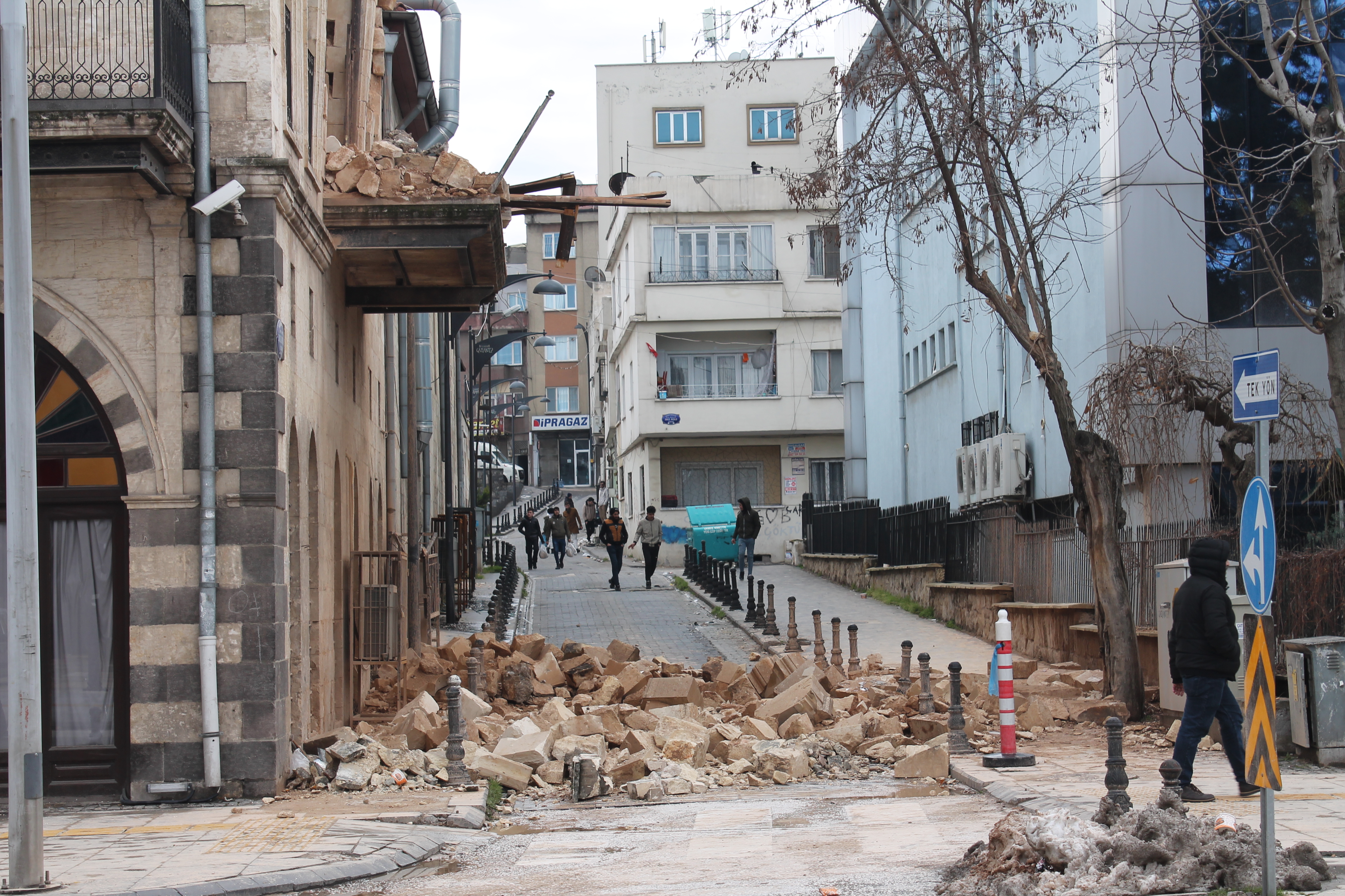 A photo of rubble in the middle of the street.
