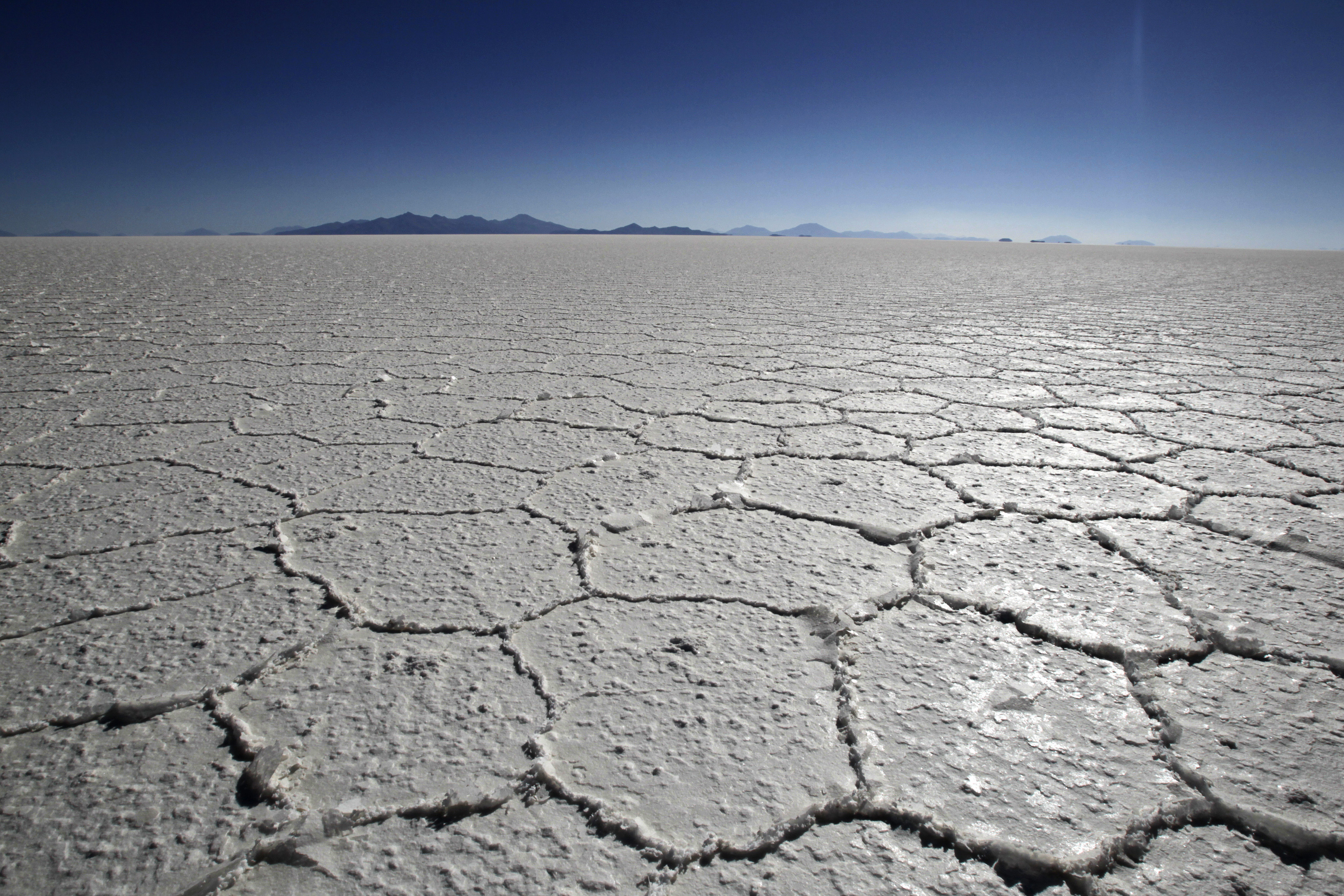 A view of the crystallized surface of the Uyuni salt lake, which holds the world's largest reserve of lithium, located at 3,656 meters (11,995 ft) above sea level in southwestern Bolivia