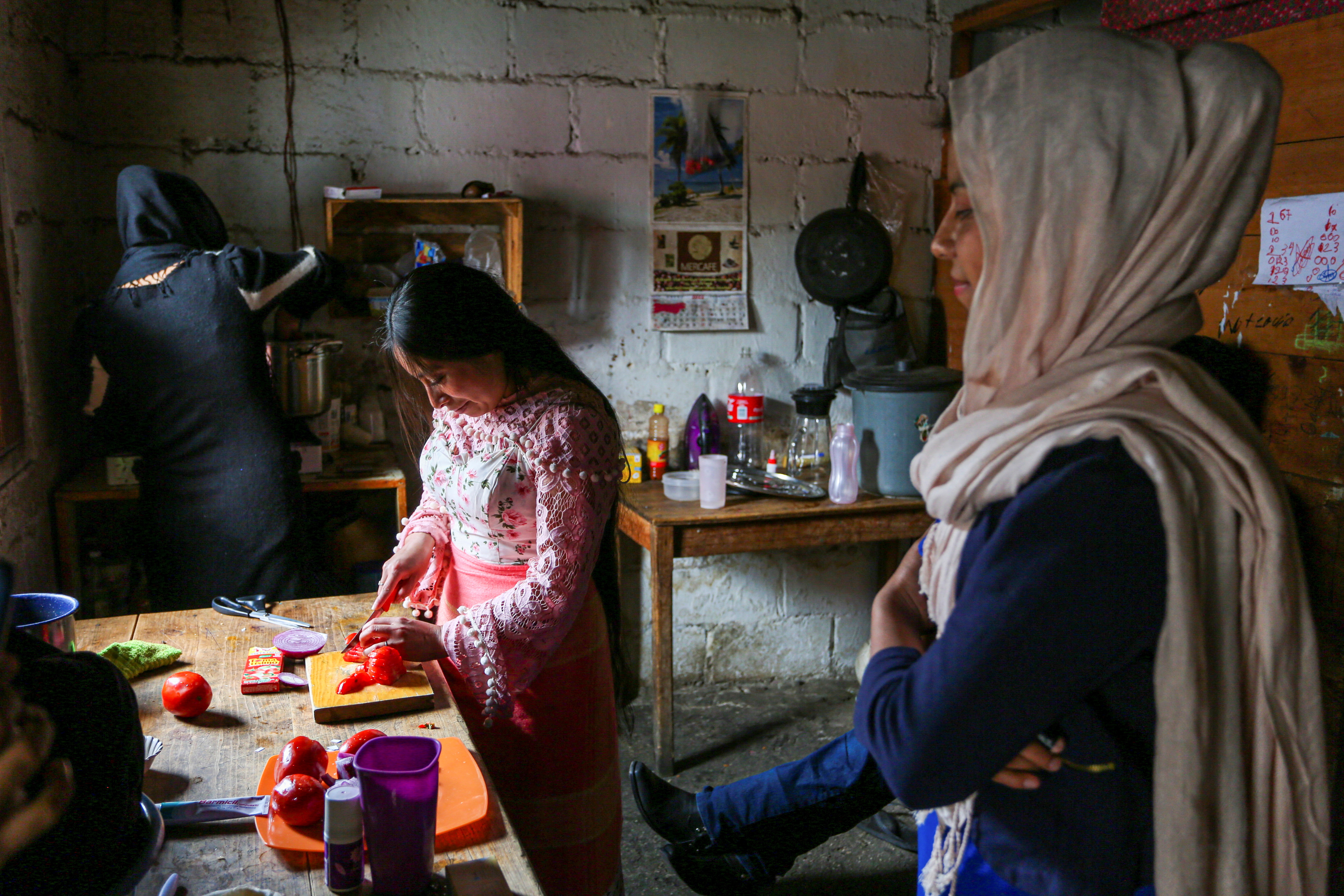 Muslim women from the Tsotsil Maya ethnic group prepare food during Eid celebrations at a mosque in San Cristobal de las Casas, in Chiapas state, Mexico 