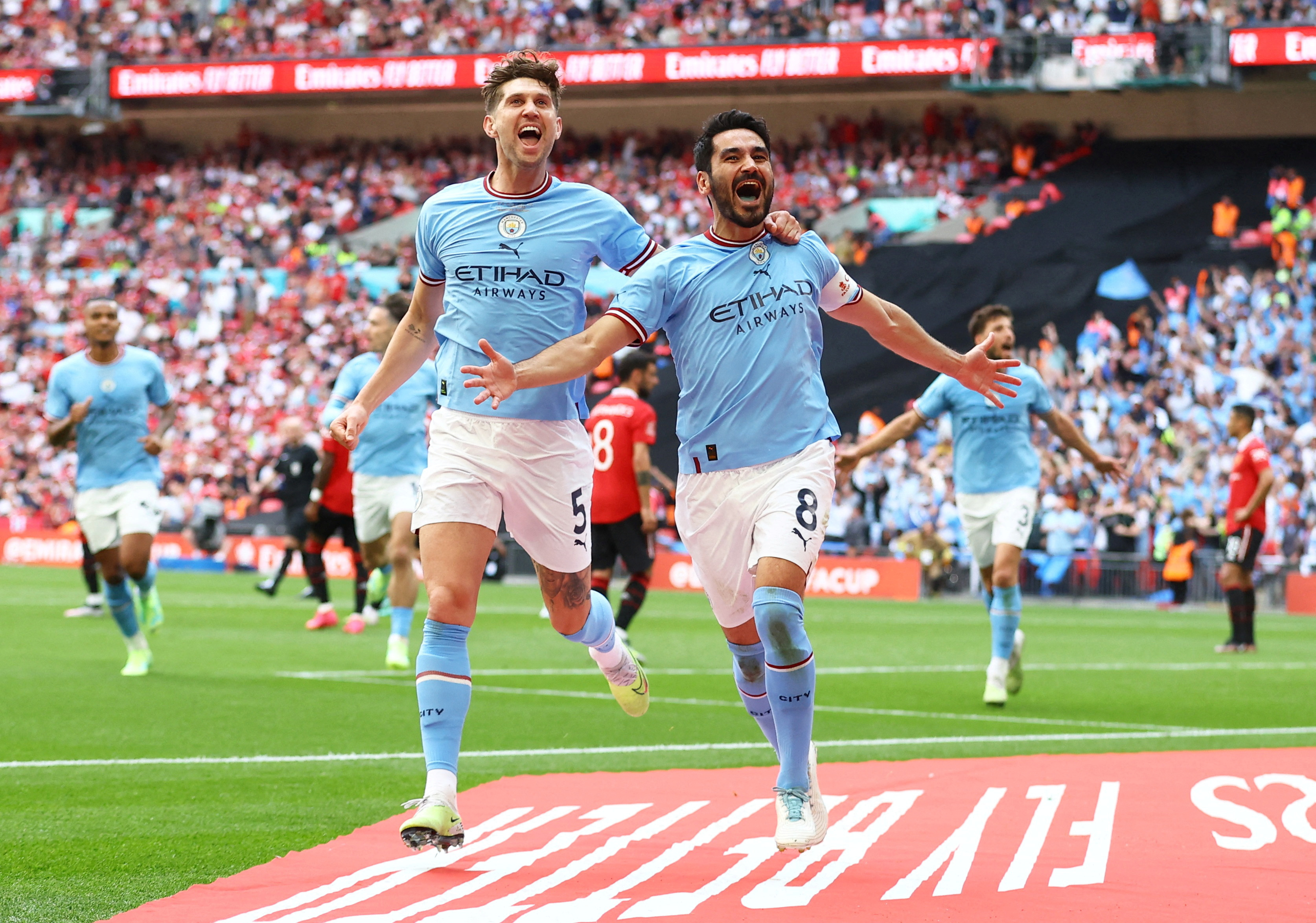 Stones and Gundogan celebrate