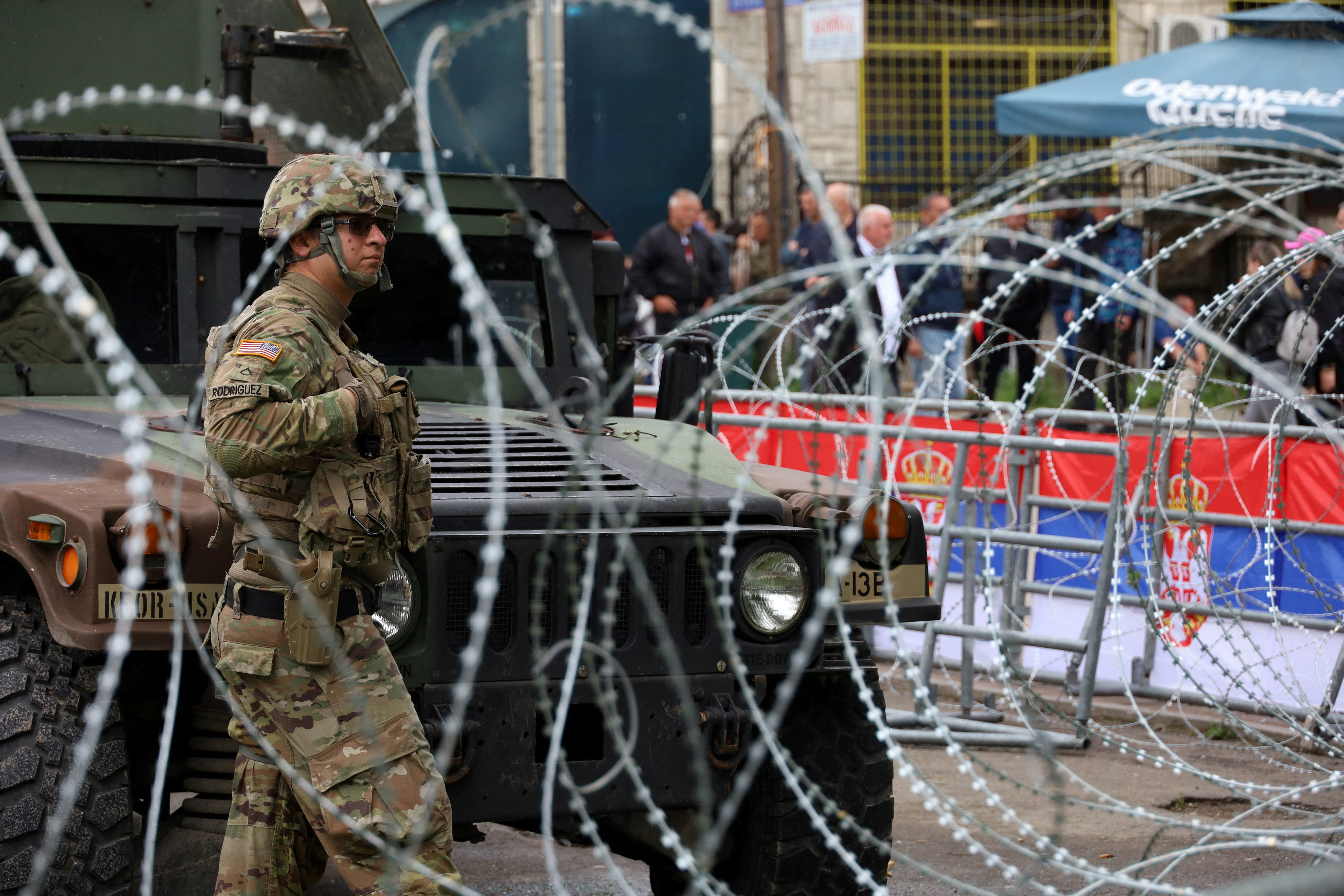 A U.S. soldier in Kosovo's NATO peackeeping force (KFOR) stands guard near a municipal office in Leposavic, Kosovo