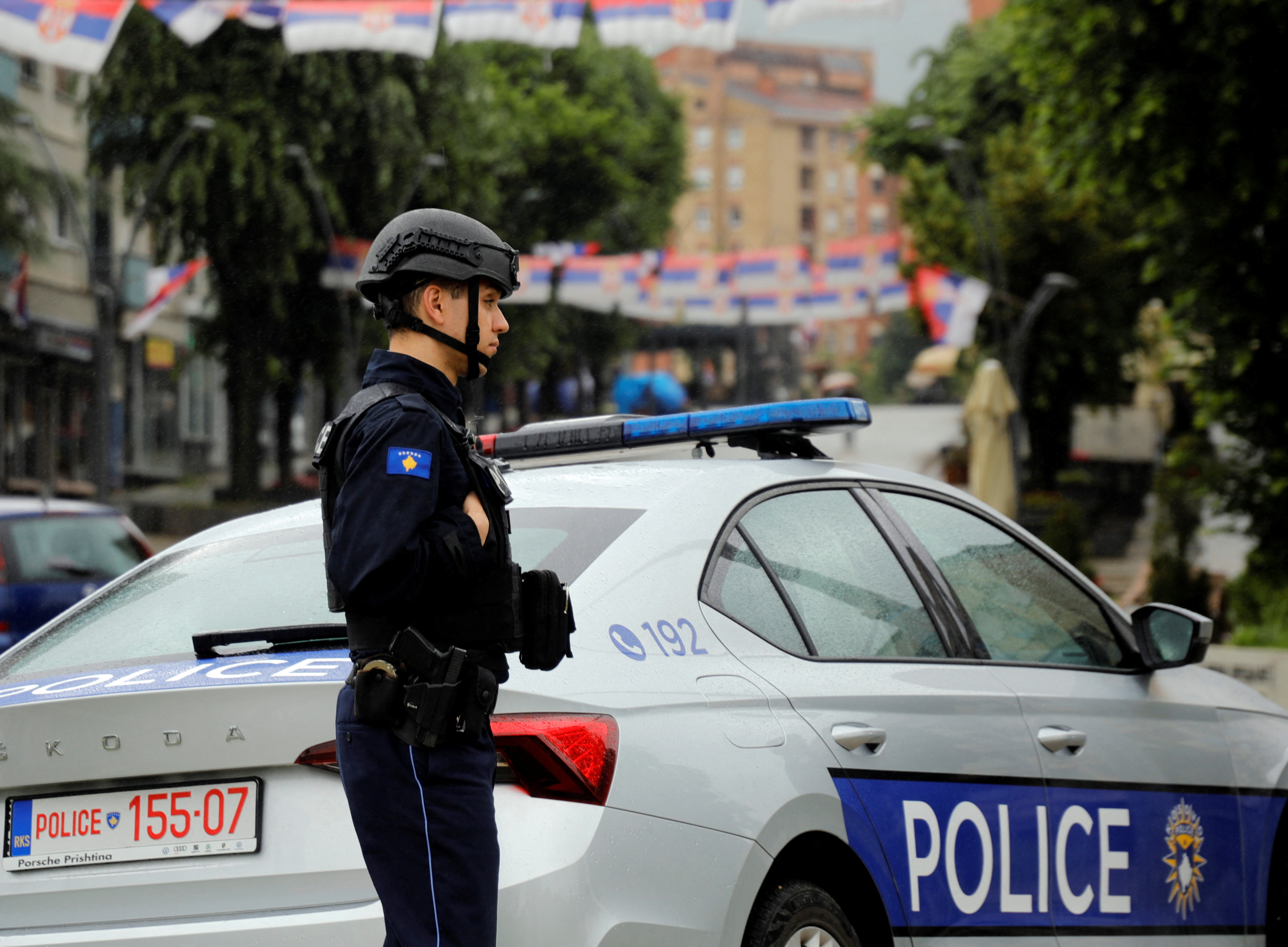 A Kosovo police officer patrols in North Mitrovica