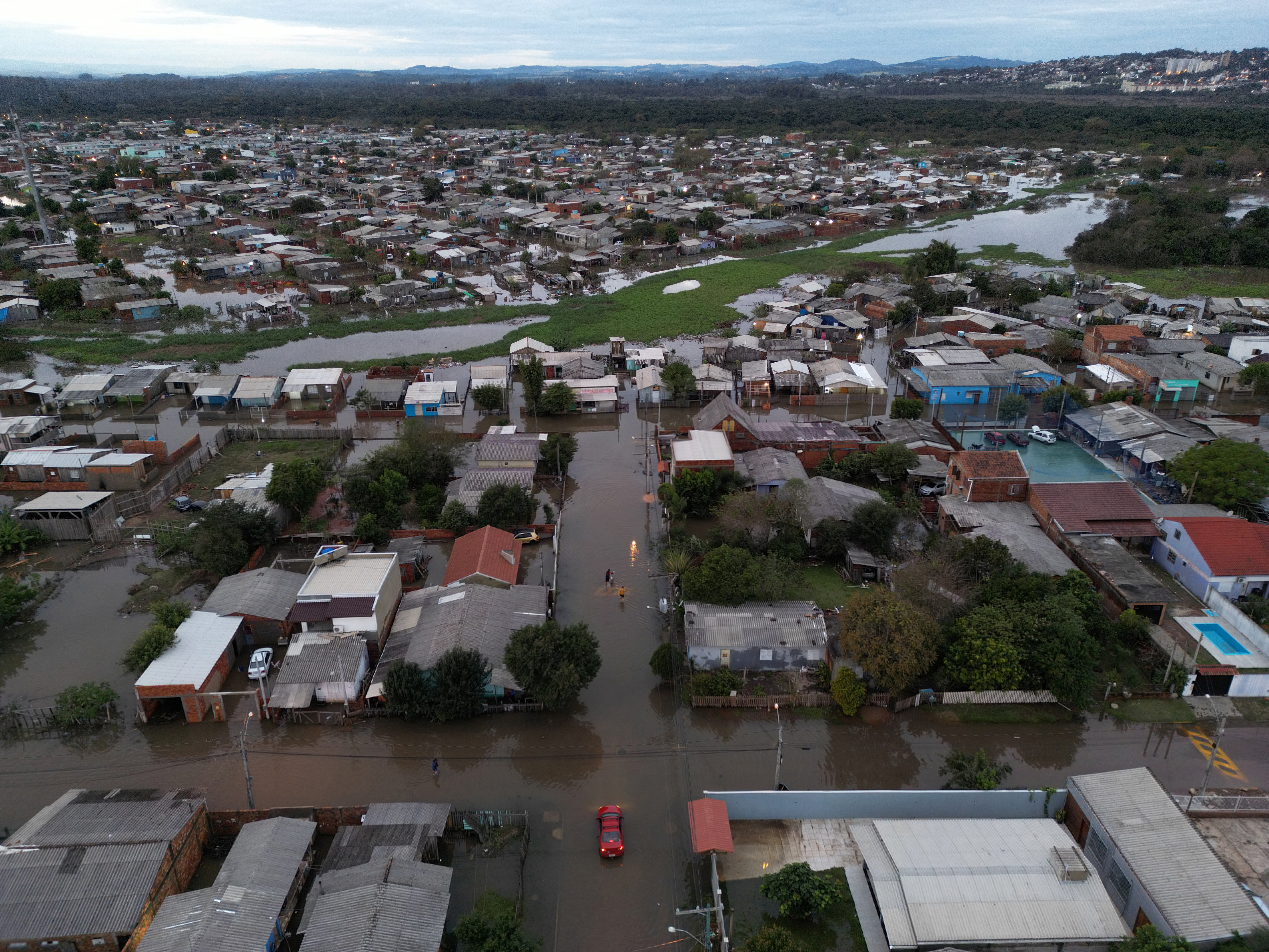 An aerial view shows damage and floods due to heavy rains after an extra-tropical cyclone, in Sao Leopoldo
