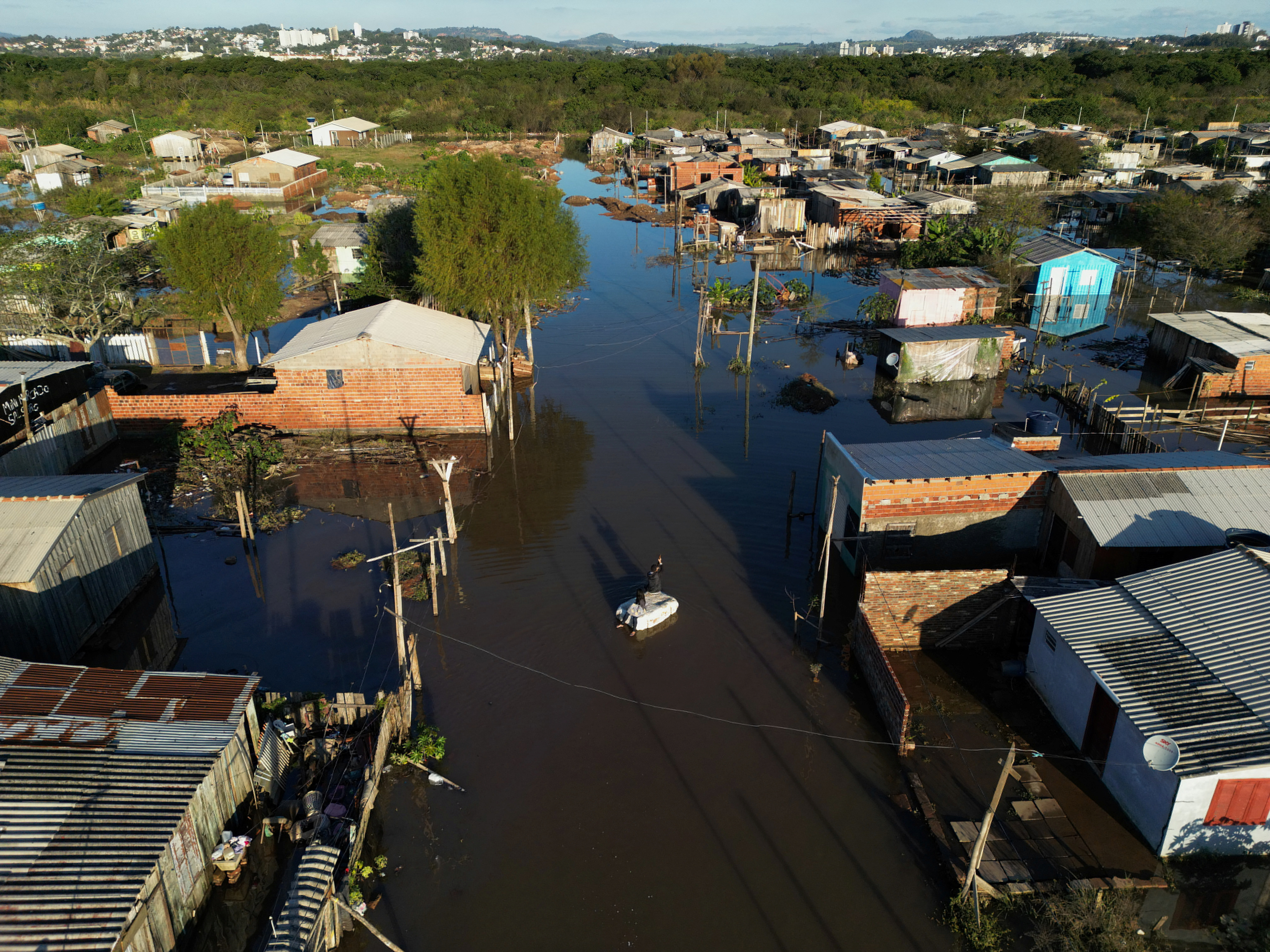 An aerial view shows the damage and flooding caused by heavy rains due to an extratropical cyclone in Sao Leopoldo