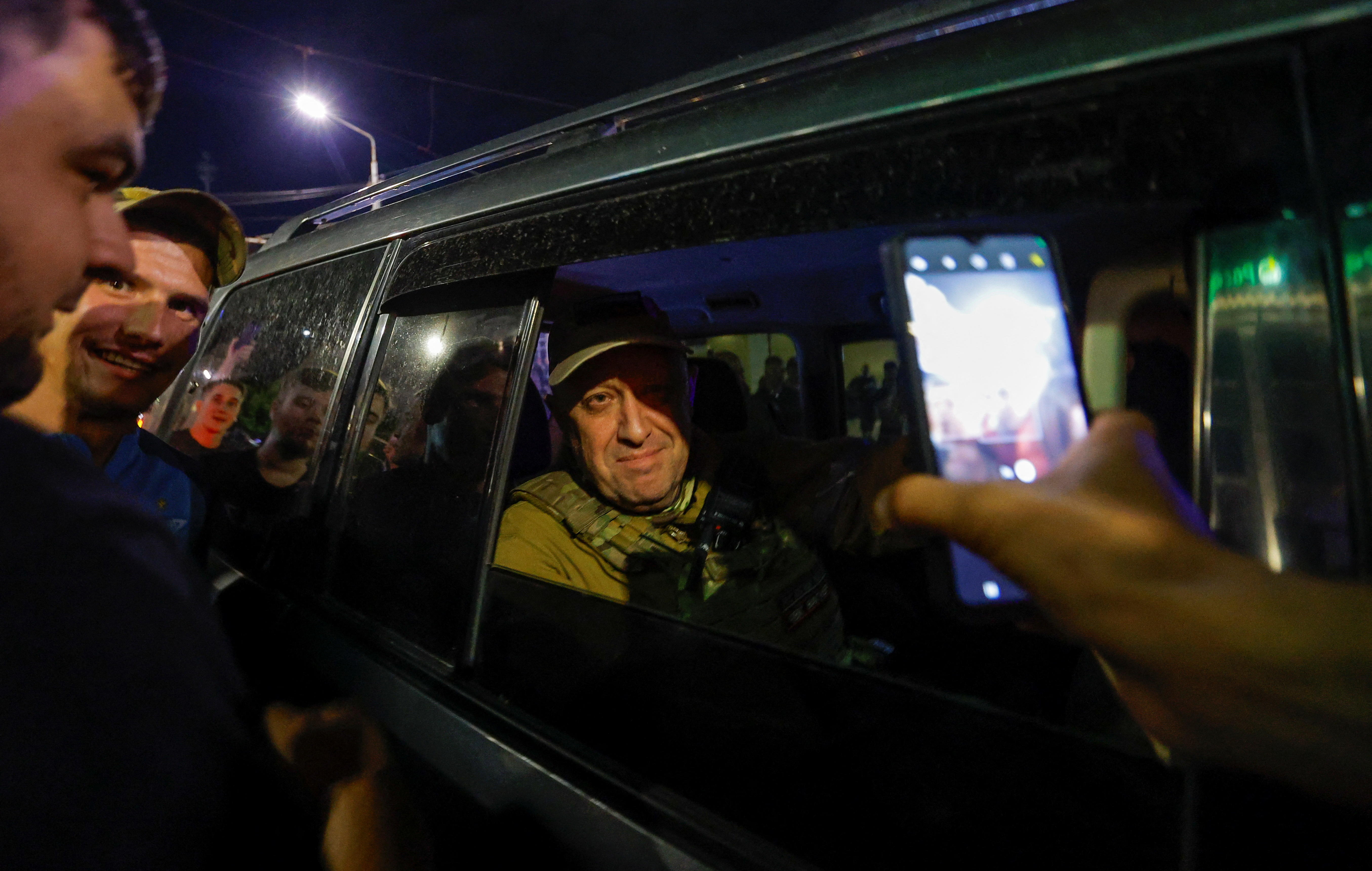 Wagner mercenary chief Yevgeny Prigozhin leaves the headquarters of the Southern Military District amid the group's pullout from the city of Rostov-on-Don, Russia