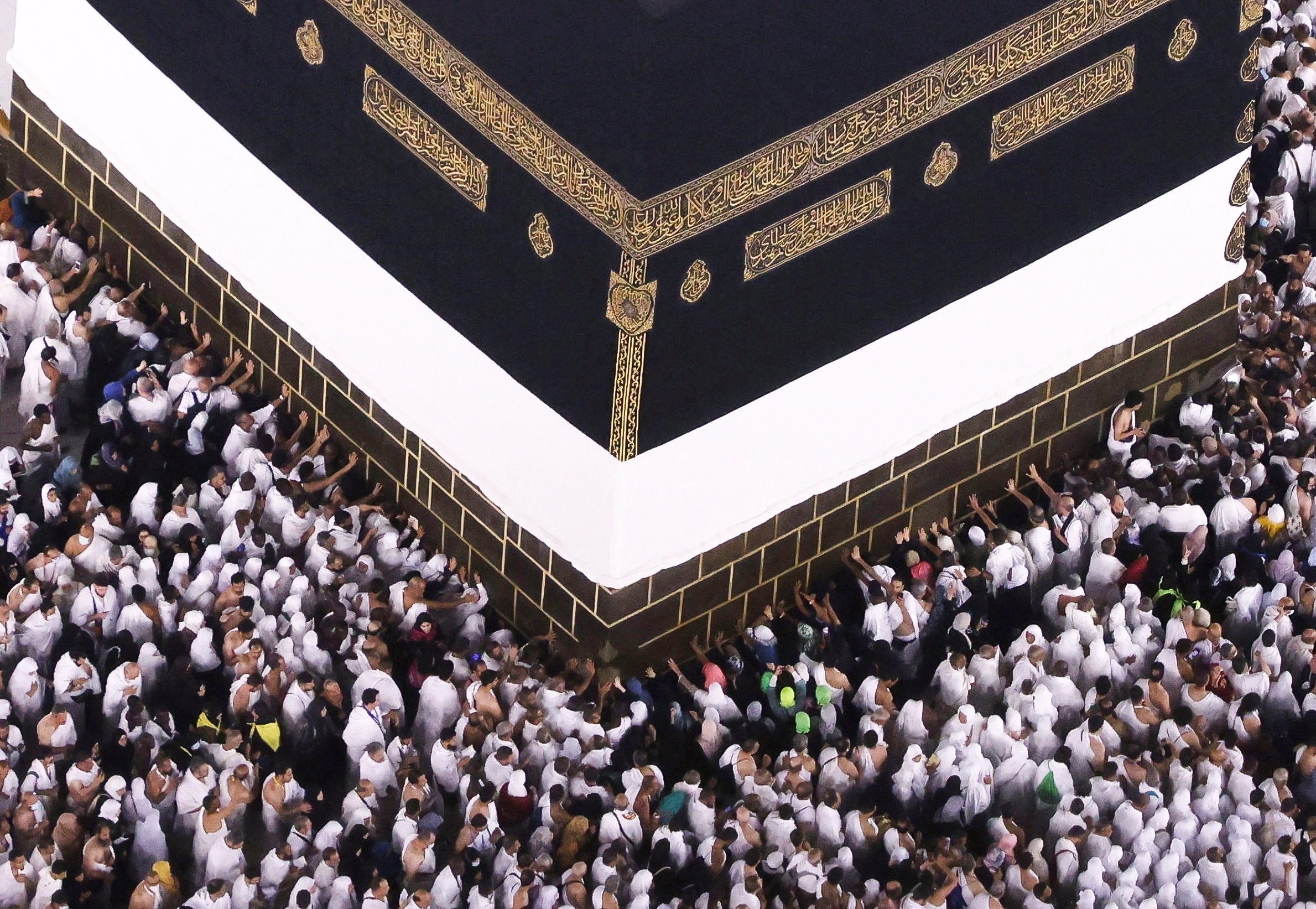 Muslim pilgrims perform the Umrah at the Holy Kaaba