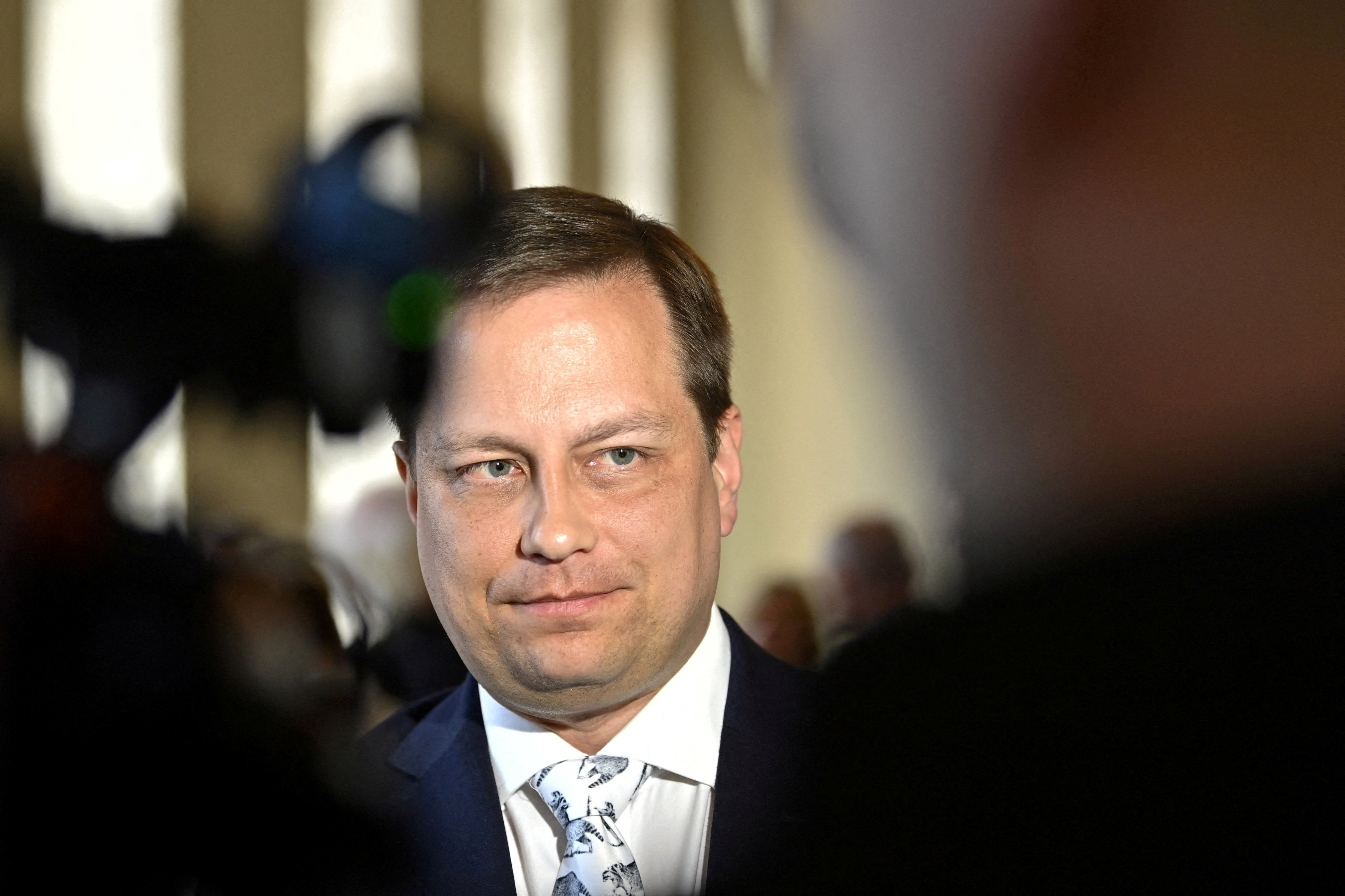 Vilhelm Junnila meets the press at a Finnish parliament in Helsinki