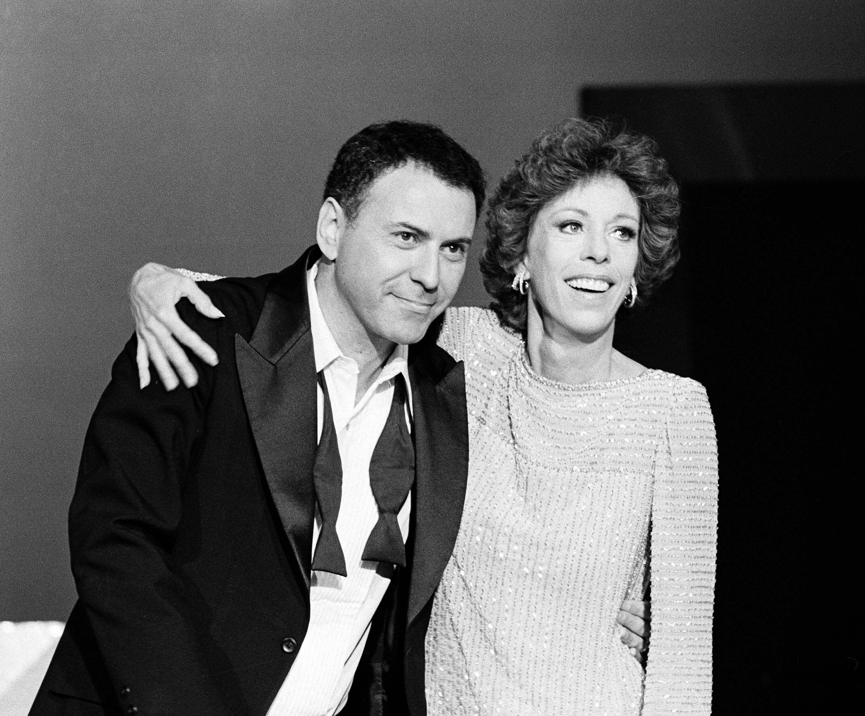 Alan Arkin poses for a photo with comedian Carol Burnett
