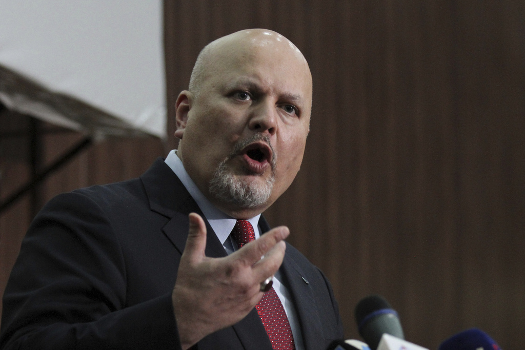 Karim Ahmed Khan speaks at a news conference