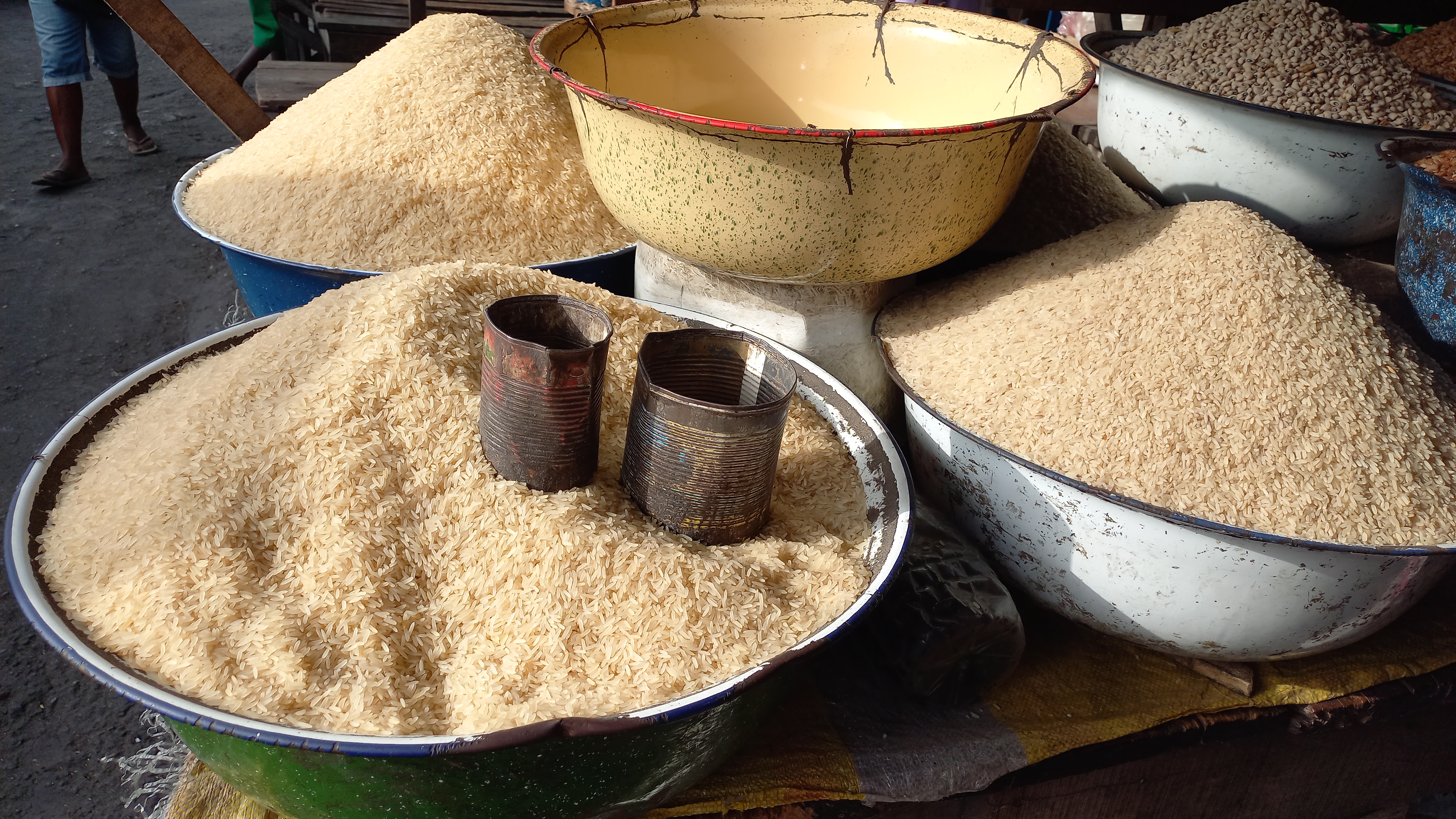Measuring tins used to sell rice in Lagos, Nigeria.