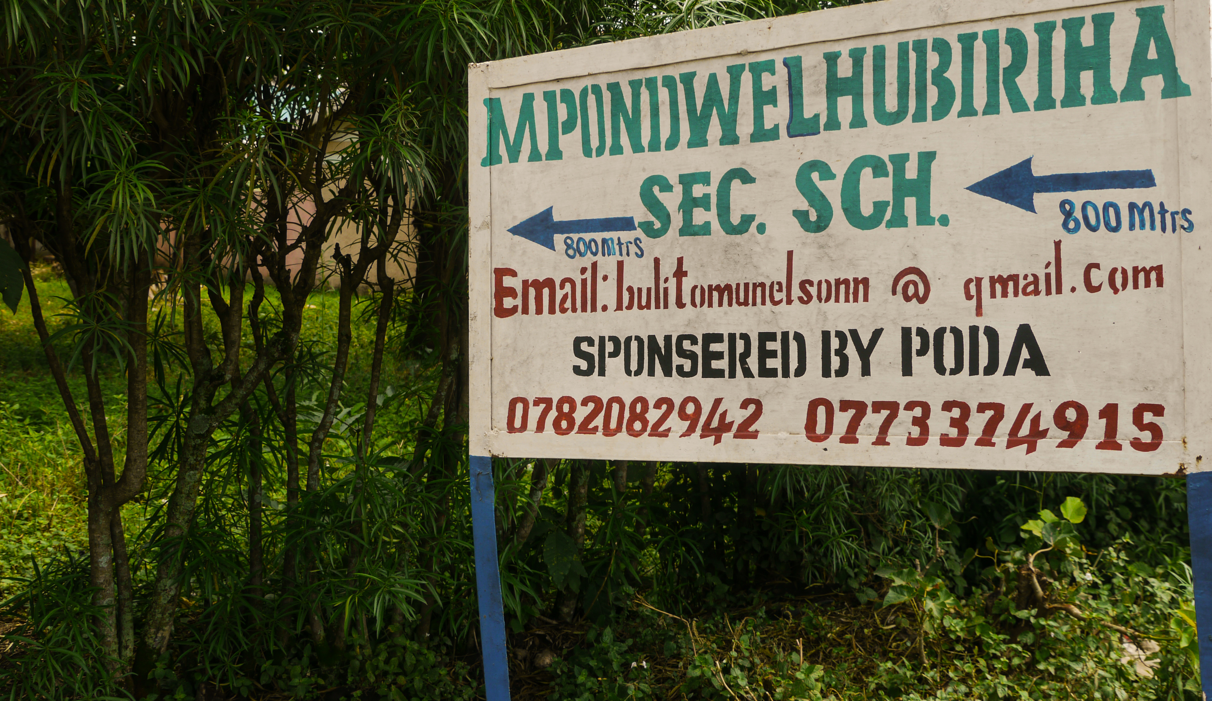 Signpost for at Lhubirira Secondary School in Mpondwe, Uganda