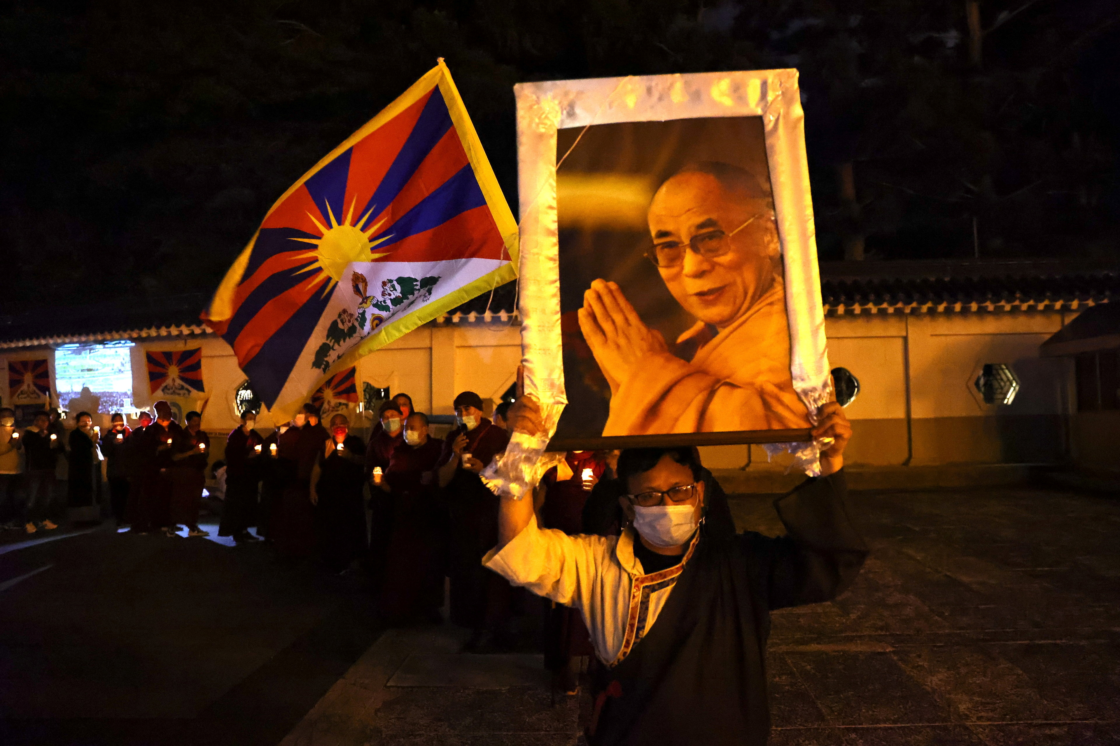Tibetans in Taiwan attend a gathering to mark the 62nd anniversary of the failed 1959 Tibetan uprising against Chinese rule, in Taipei, Taiwan, March 10, 2021. REUTERS/Ann Wang