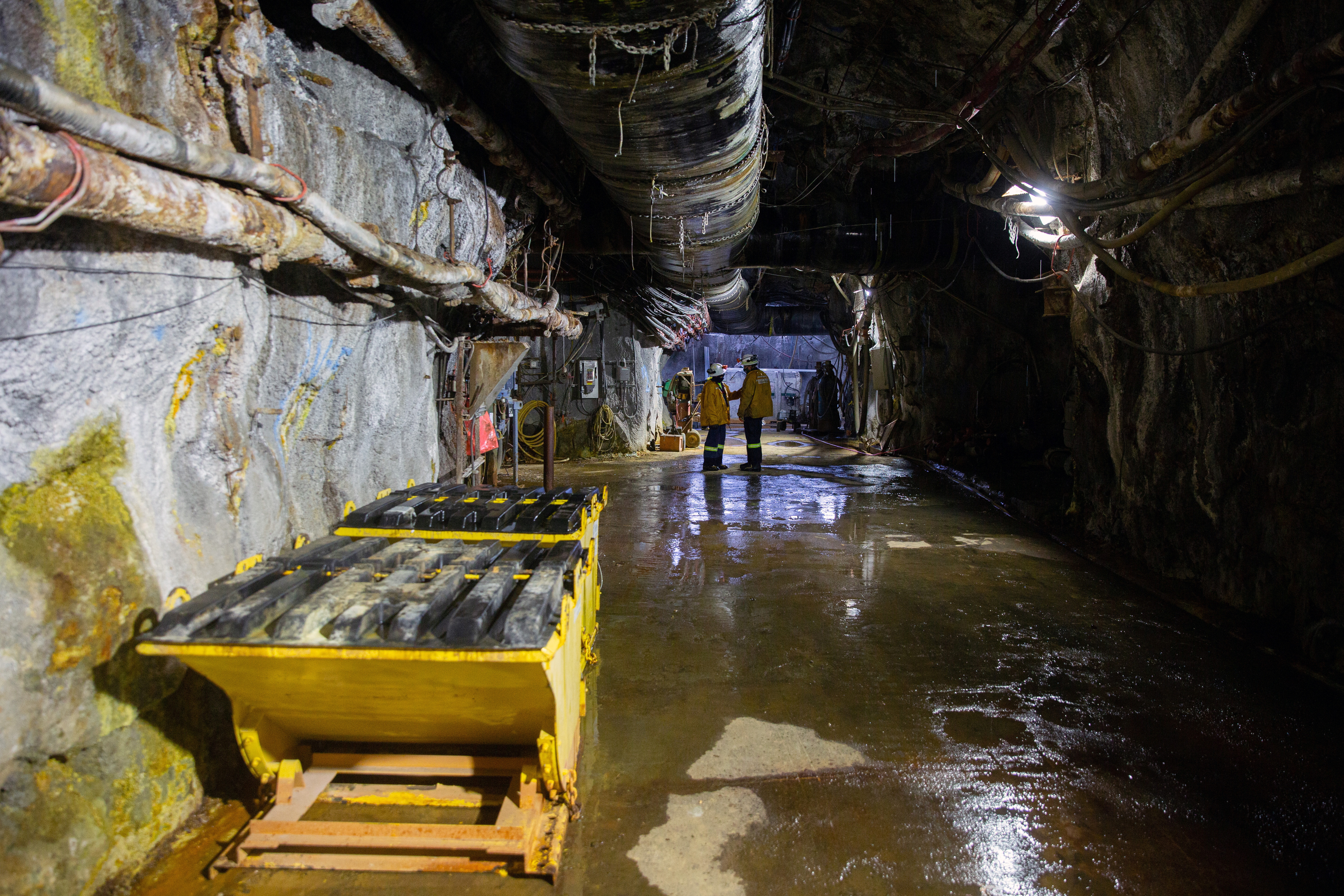 Mine workers talk 6780 ft (2066 m) underground in the Resolution Copper exploratory mine shaft in Arizona, US