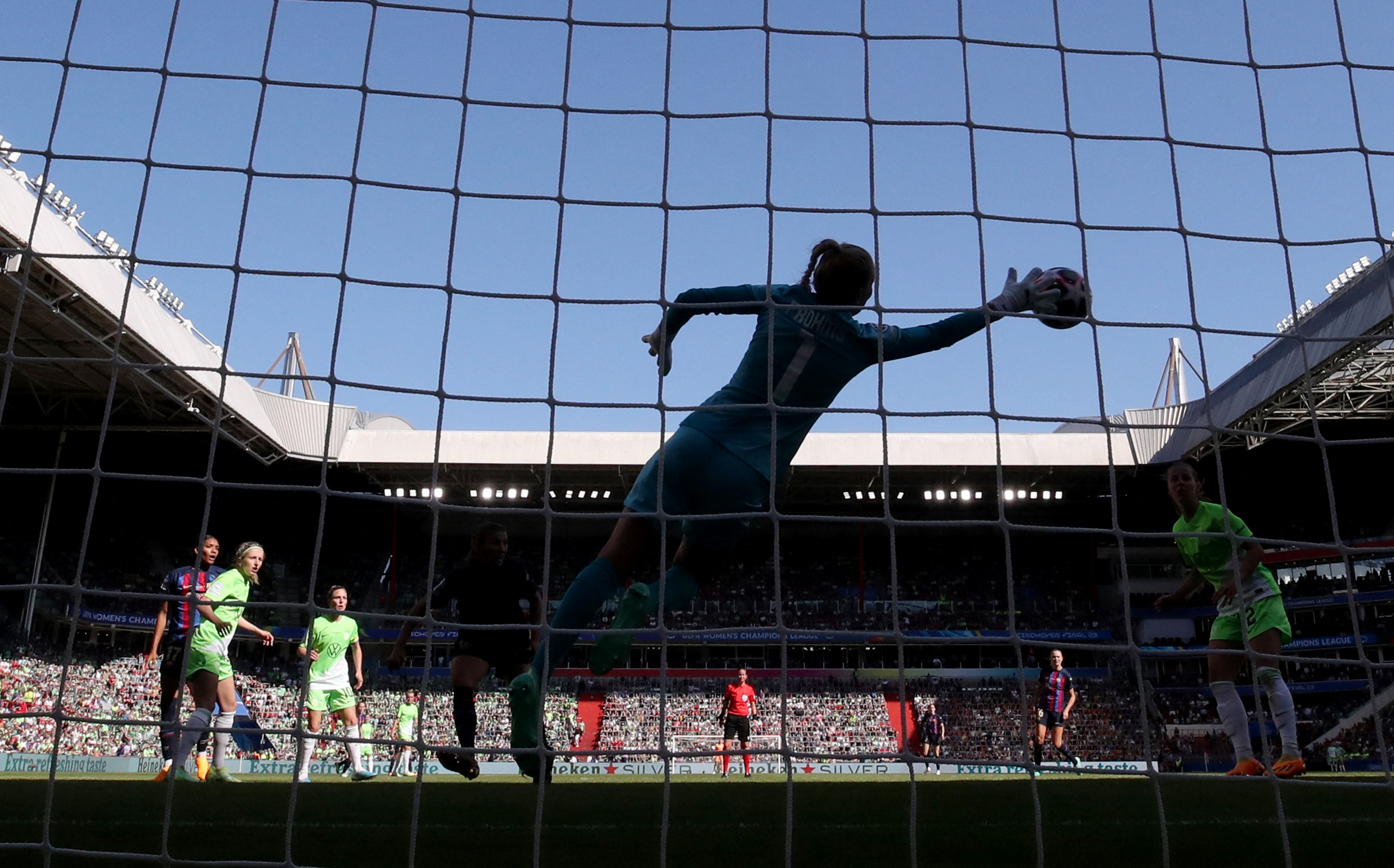 FC Barcelona's Patricia Guijarro scores their second goal past VfL Wolfsburg's Merle Frohms