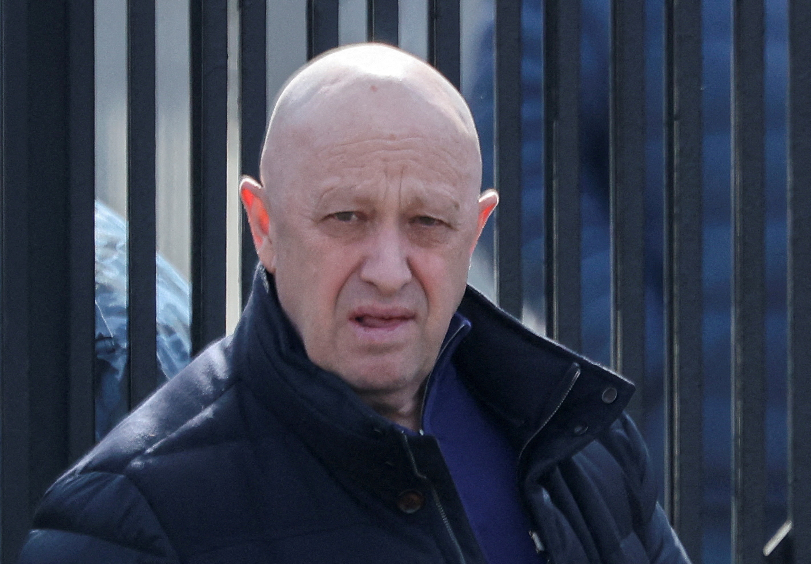 Founder of Wagner private mercenary group Yevgeny Prigozhin leaves a cemetery before the funeral of a Russian military blogger who was killed in a bomb attack in a St Petersburg cafe,