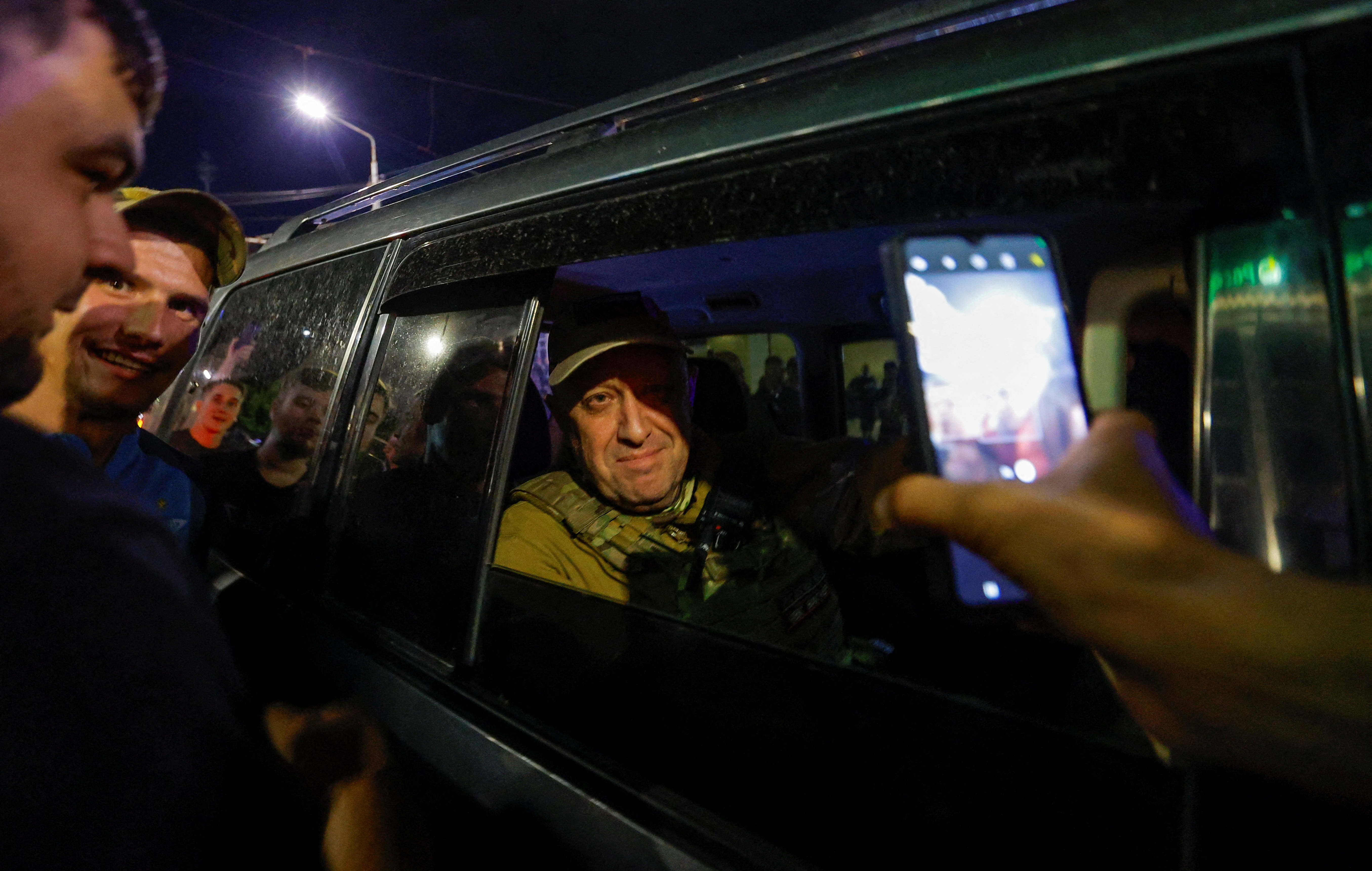 Wagner mercenary chief Yevgeny Prigozhin leaves the headquarters of the Southern Military District amid the group's pullout from the city of Rostov-on-Don, Russia.