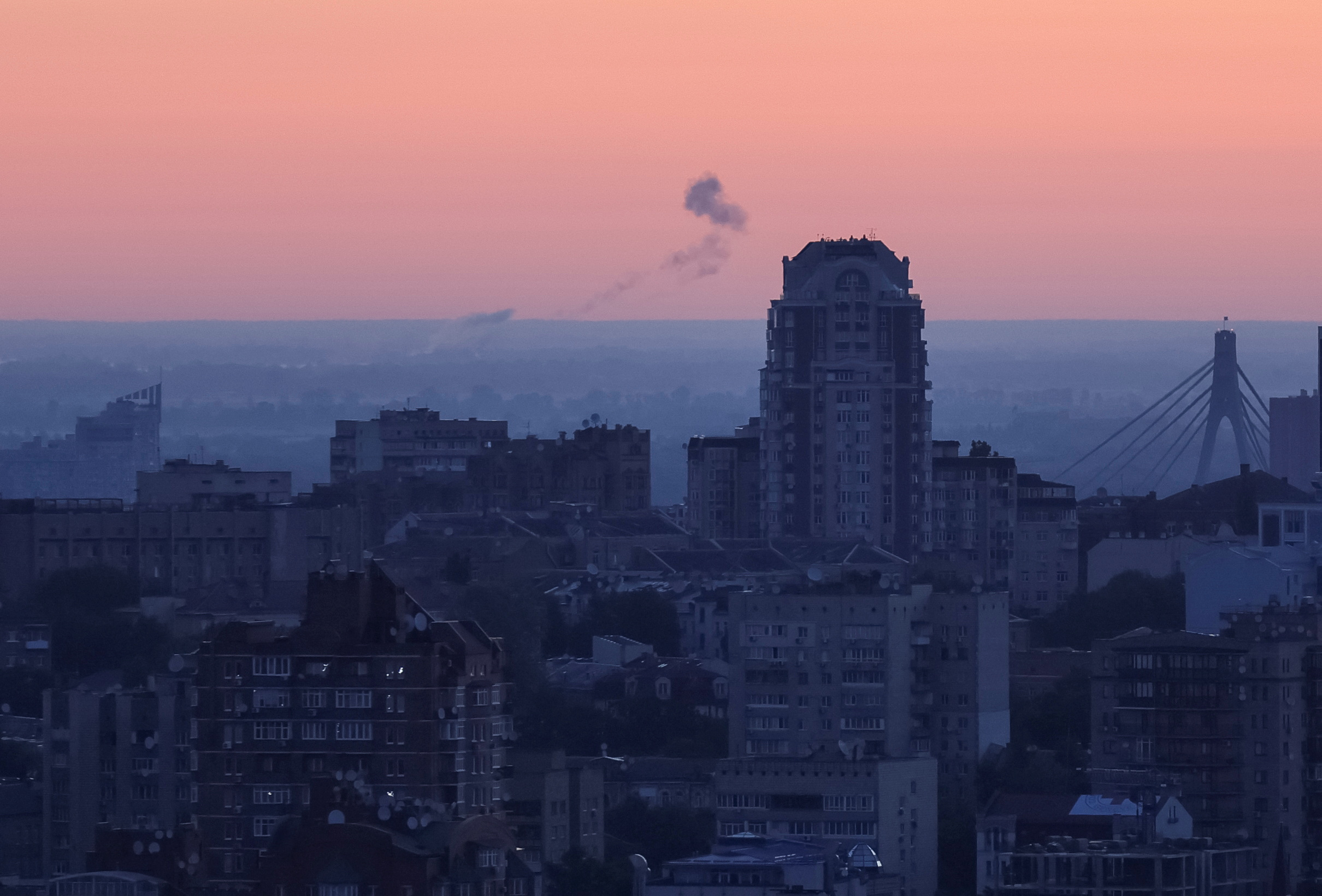 Smoke rises in the sky over the city after a Russian drone strike, amid Russia's attack on Ukraine, in Kyiv, Ukraine July 19, 2023. REUTERS/Gleb Garanich