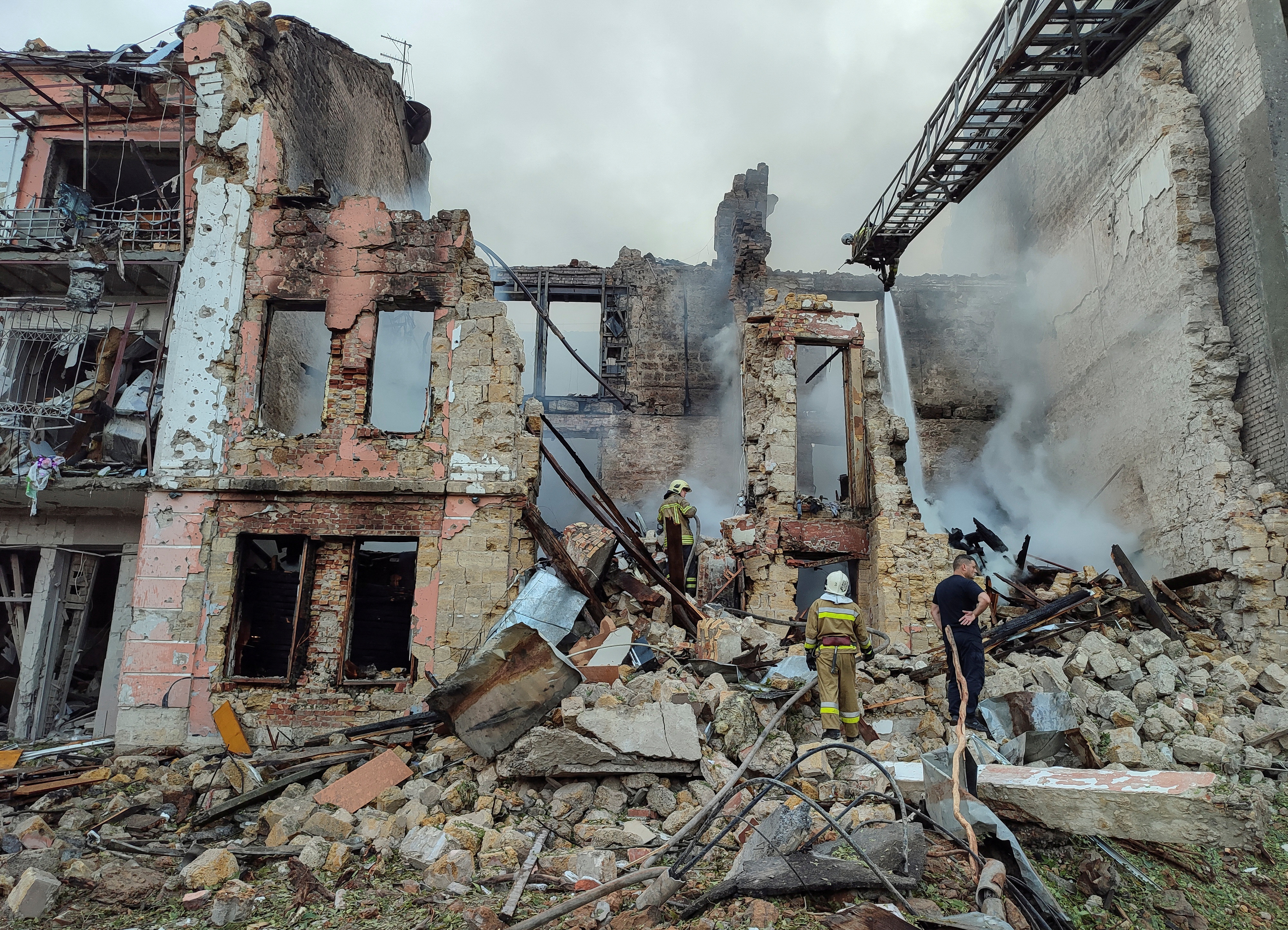 Rescuers work at a site of a residential building heavily damaged by a Russian missile attack, as Russia's attack on Ukraine continues, in Mykolaiv, Ukraine July 20, 2023.