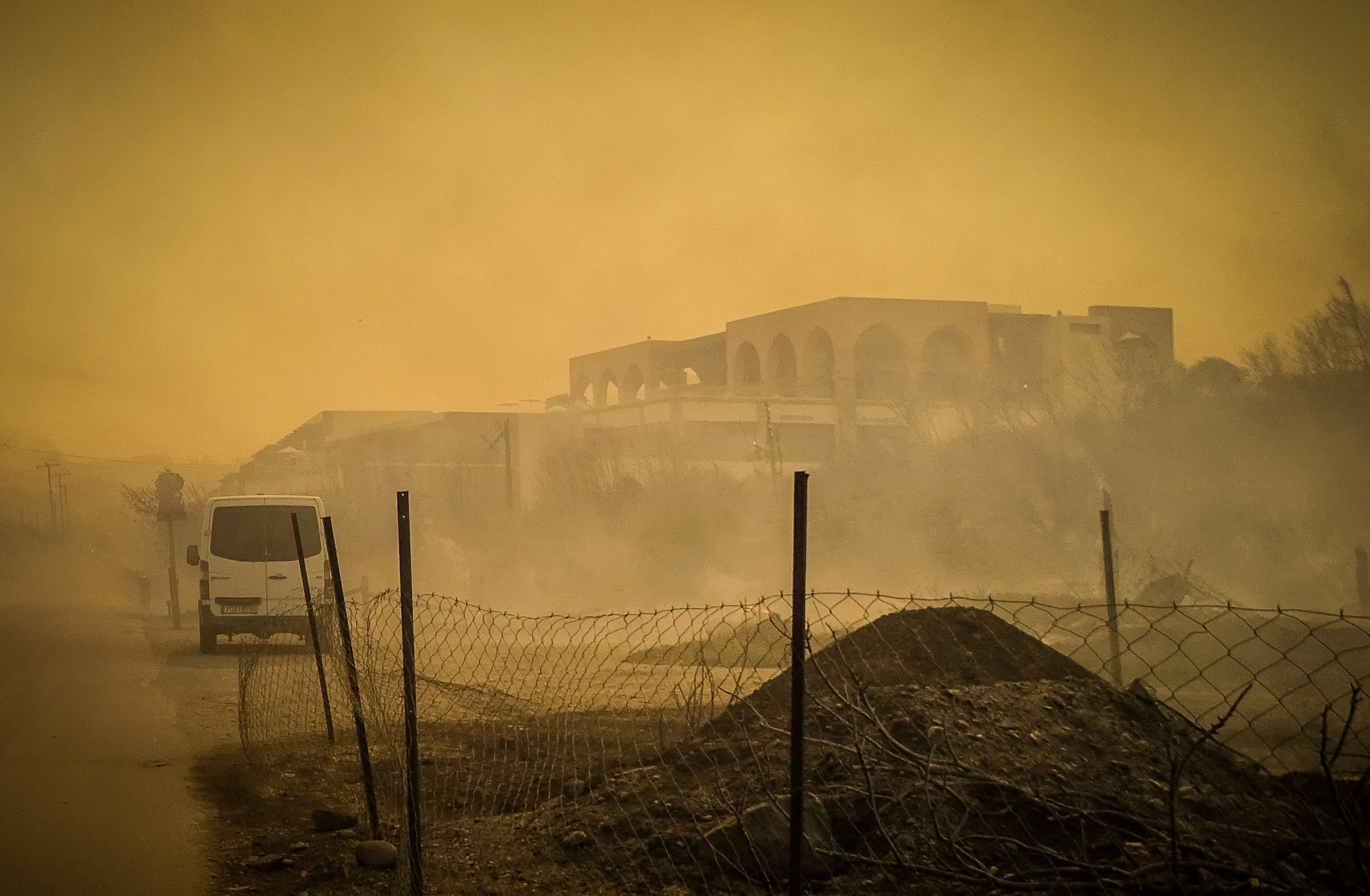 A burnt hotel is seen during a wildfire on the island of Rhodes,