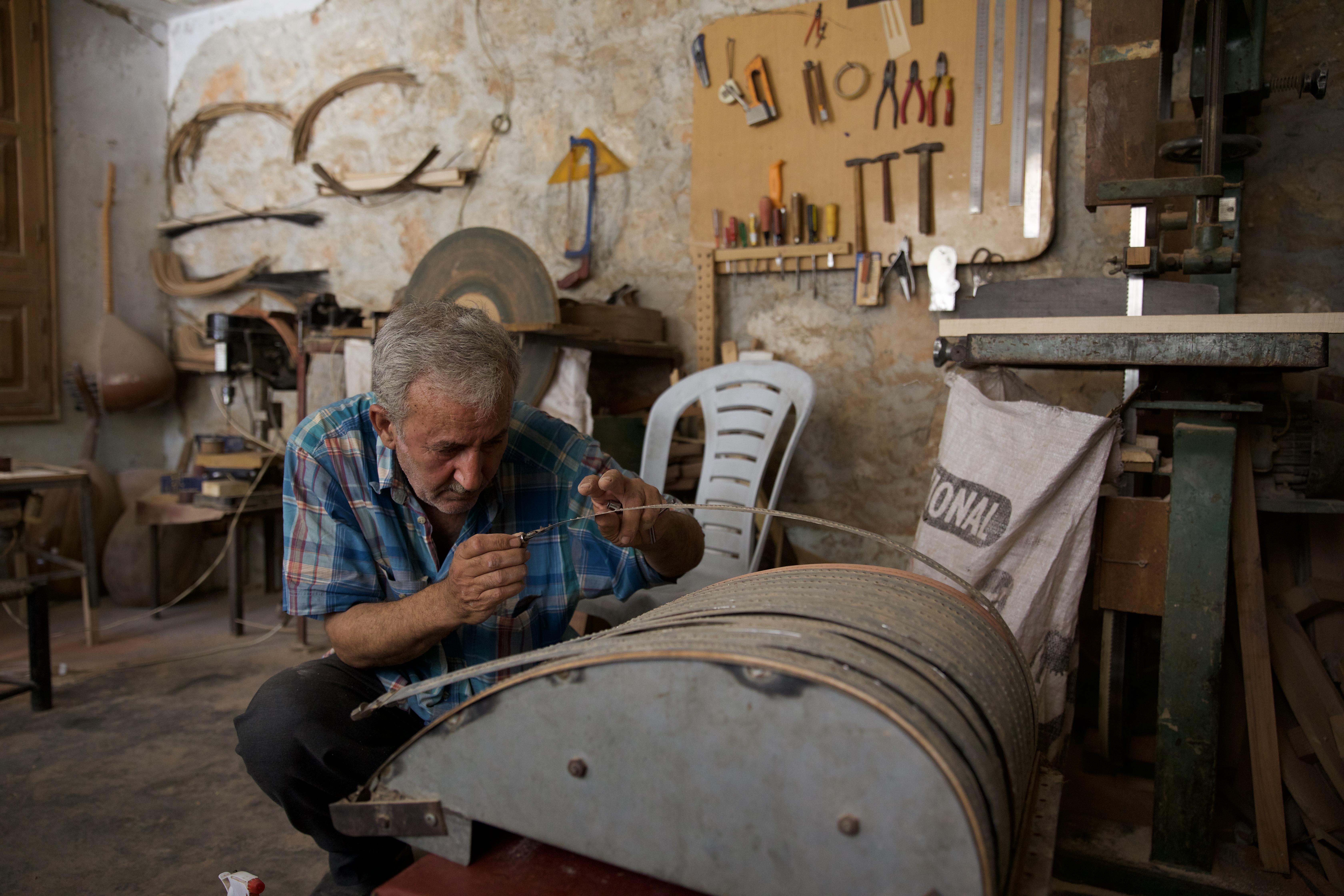 Hassan in his workshop