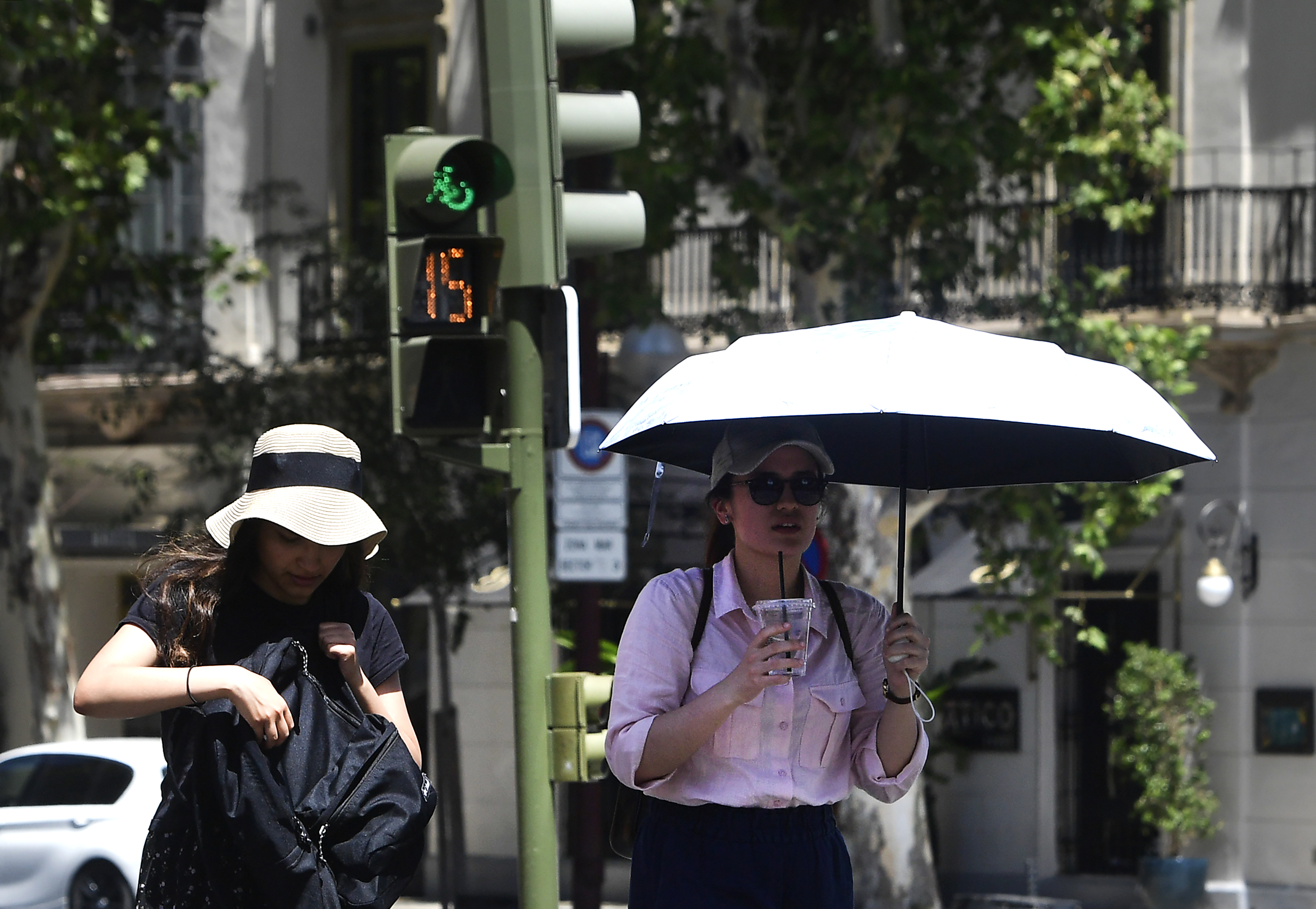 Dangerous heatwaves strike globe as wildfires rage