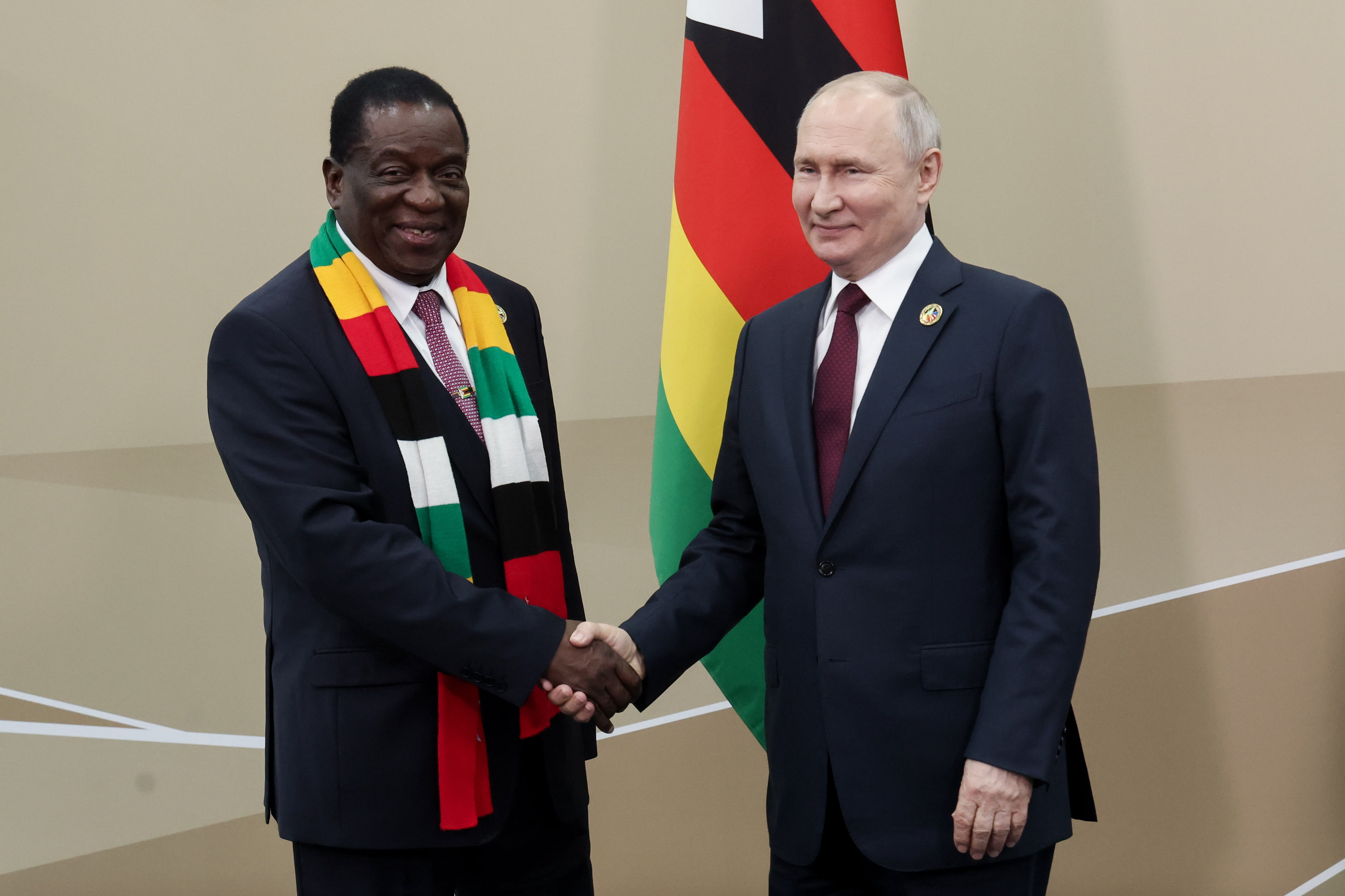 Russian President Vladimir Putin meets with his Zimbabwe counterpart Emmerson Mnangagwa during the second Russia-Africa summit in Saint Petersburg on July 27, 2023. (Photo by Vyacheslav PROKOFYEV / TASS Host Photo Agency / AFP) / RESTRICTED TO EDITORIAL USE - MANDATORY CREDIT "AFP PHOTO / TASS HOST PHOTO AGENCY / VYACHESLAV PROKOFYEV" - NO MARKETING NO ADVERTISING CAMPAIGNS - DISTRIBUTED AS A SERVICE TO CLIENTS - RESTRICTED TO EDITORIAL USE - MANDATORY CREDIT "AFP PHOTO / TASS Host Photo Agency / Vyacheslav Prokofyev" - NO MARKETING NO ADVERTISING CAMPAIGNS - DISTRIBUTED AS A SERVICE TO CLIENTS /