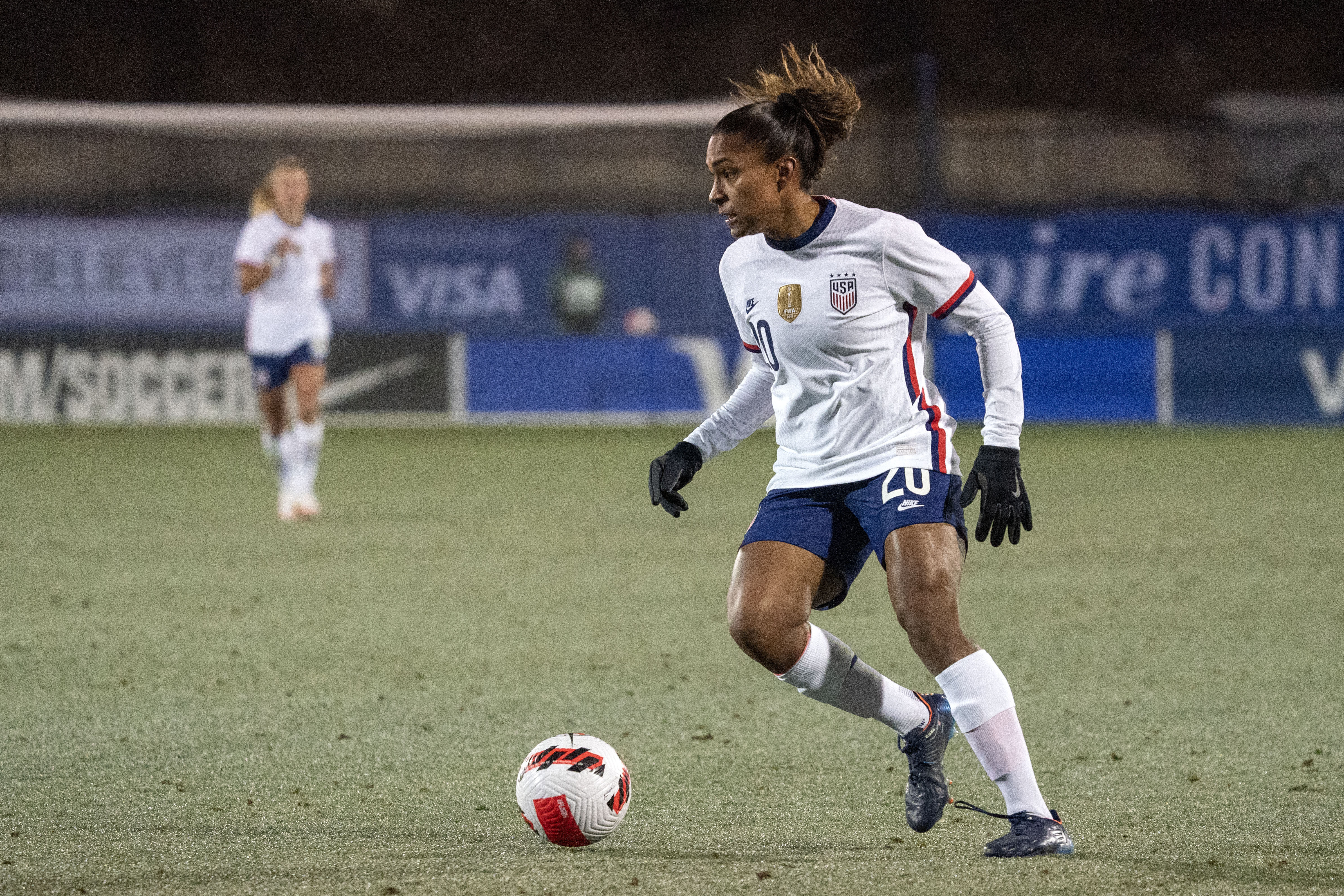 US forward Catarina Macario dribbles a football