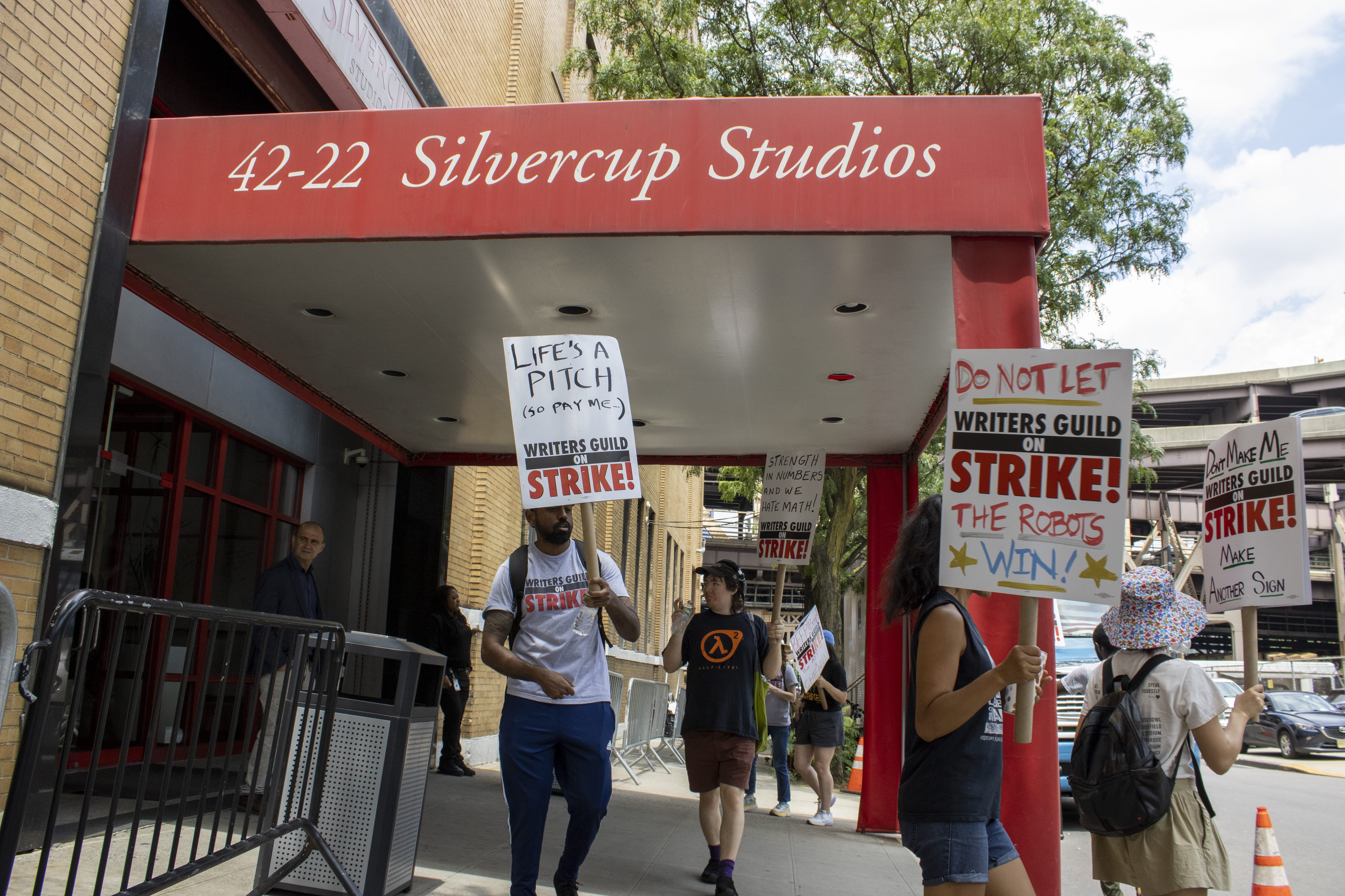 Film and TV writers and their supporters picket at the Silvercup Studios production facilities in the Queens borough of New York