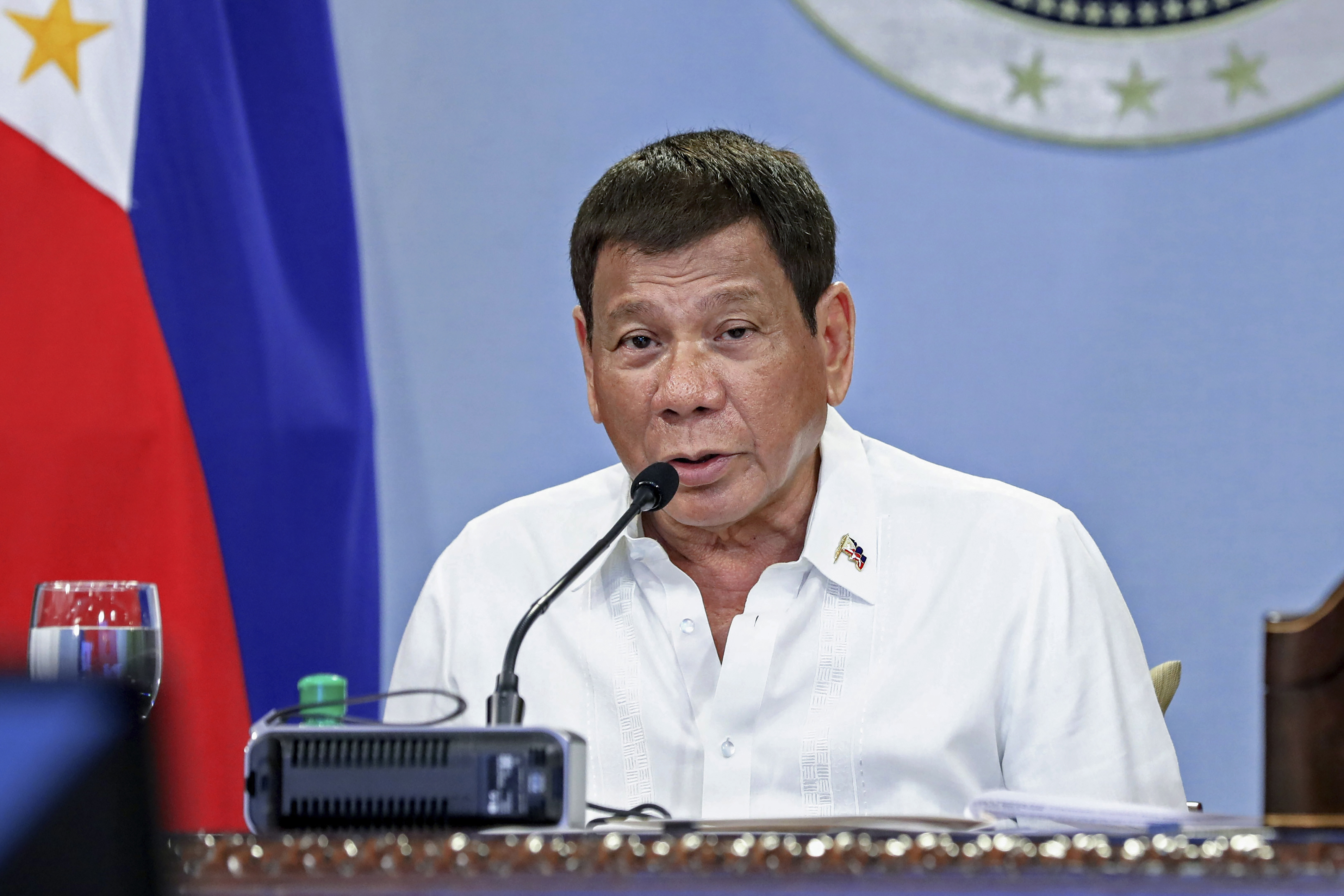 Philippine President Rodrigo Duterte talks with members of the Inter-Agency Task Force on the Emerging Infectious Diseases at the Malacanang Presidential Palace in Manila, Philippines
