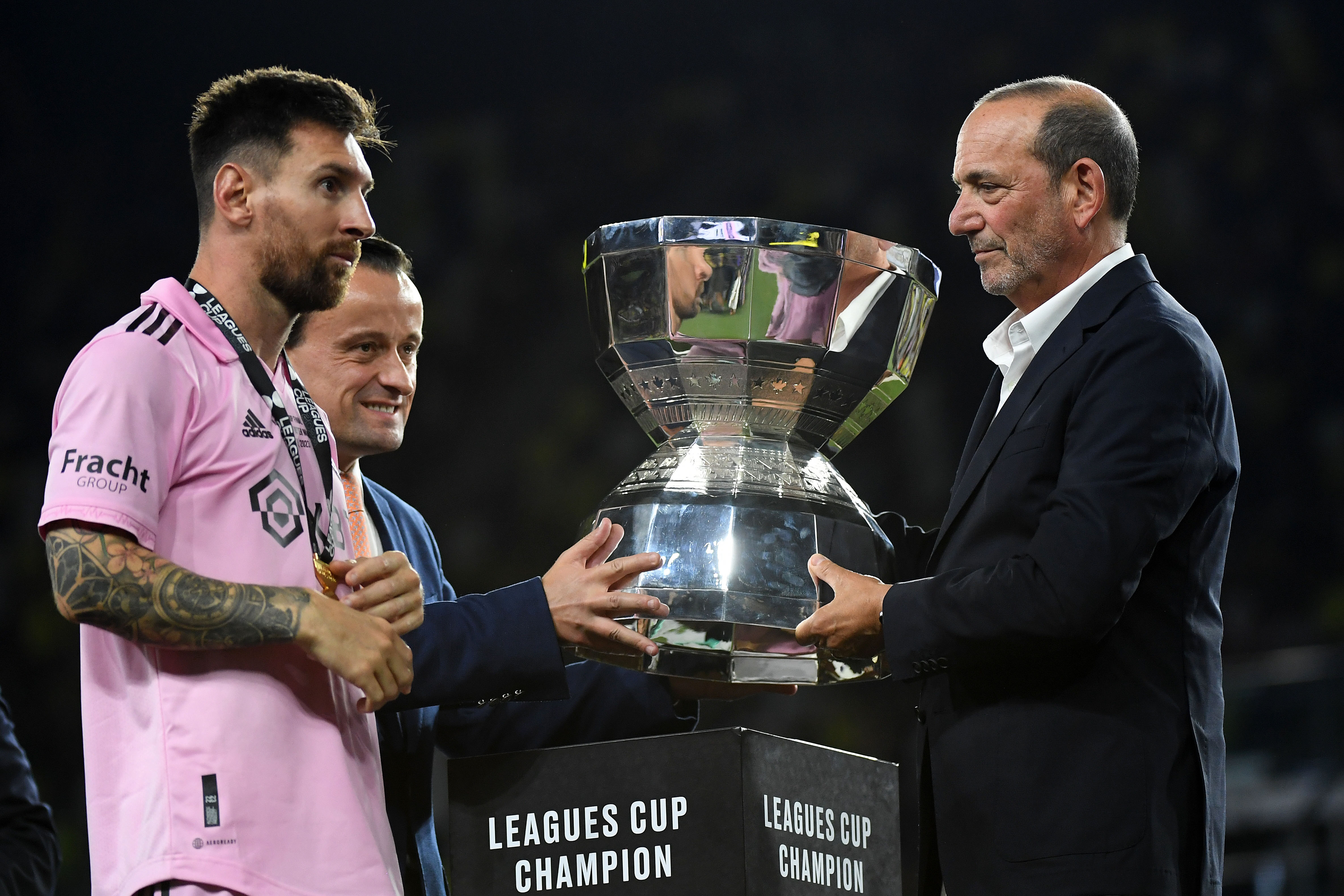 Lionel Messi receives trophy