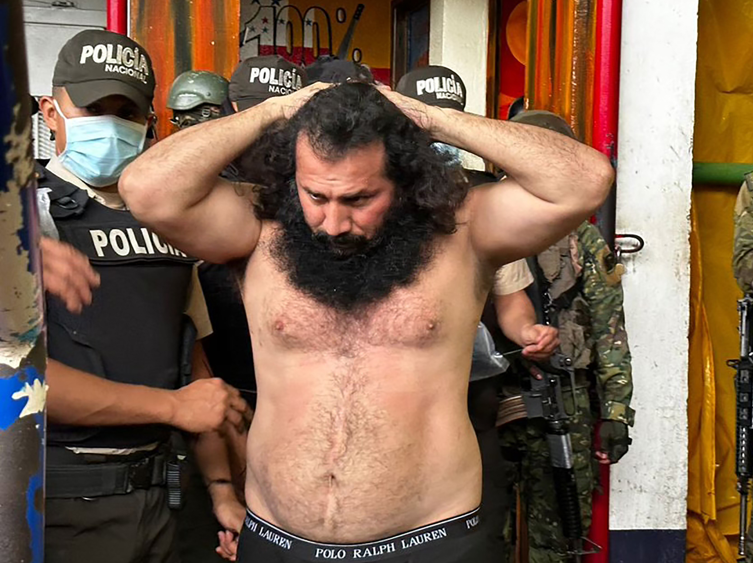 Picture released by the Ecuadorean Armed Forces shows Adolfo Macias, aka Fito, leader of the Los Choneros criminal gang, while being transferred to a maximum-security complex inside the Zonal Penitentiary No 8 in Guayaquil, Ecuador.