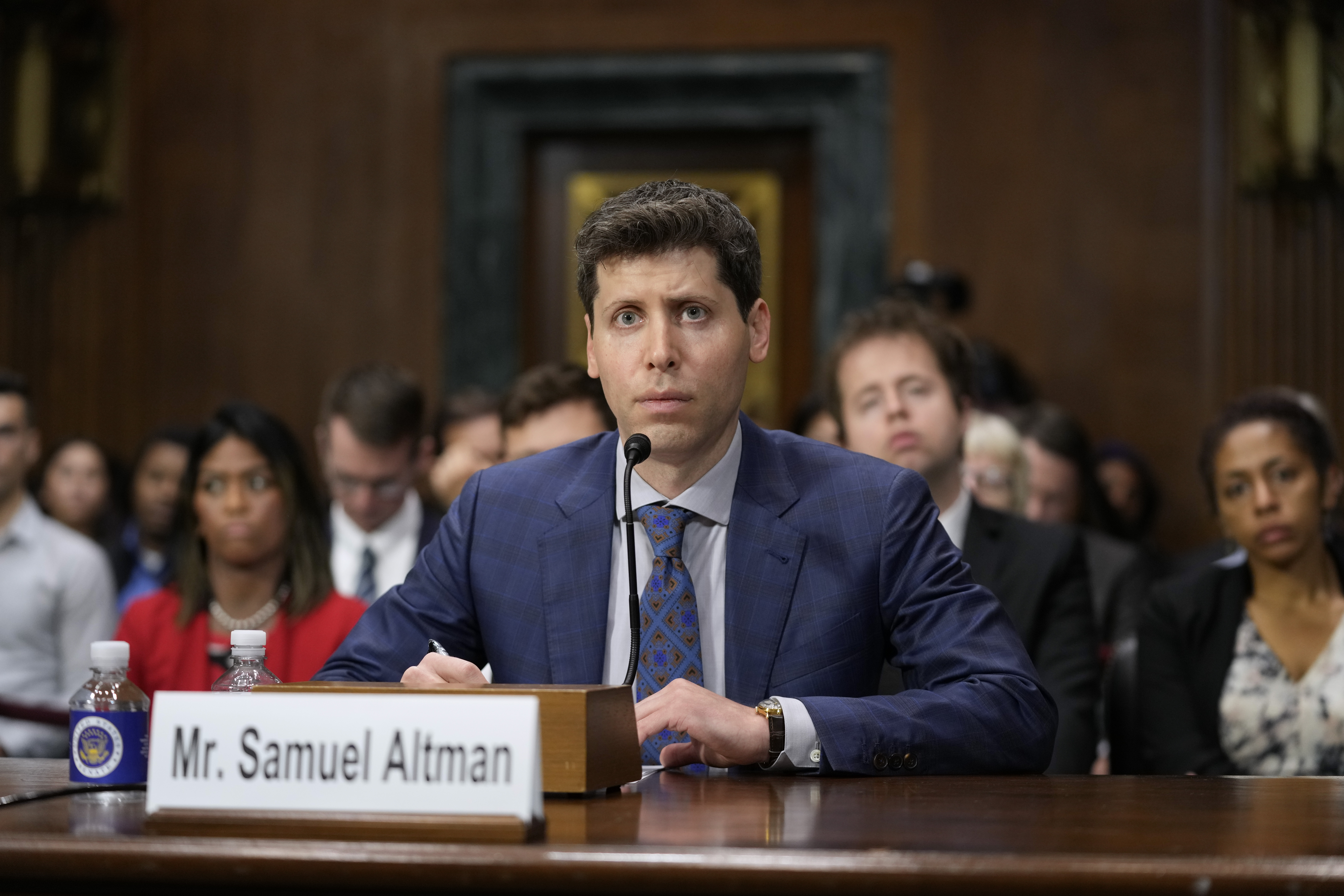 OpenAI CEO Sam Altman attends a Senate Judiciary Subcommittee on Privacy, Technology and the Law hearing on artificial intelligence, Tuesday, May 16, 2023, on Capitol Hill in Washington. (AP Photo/Patrick Semansky)