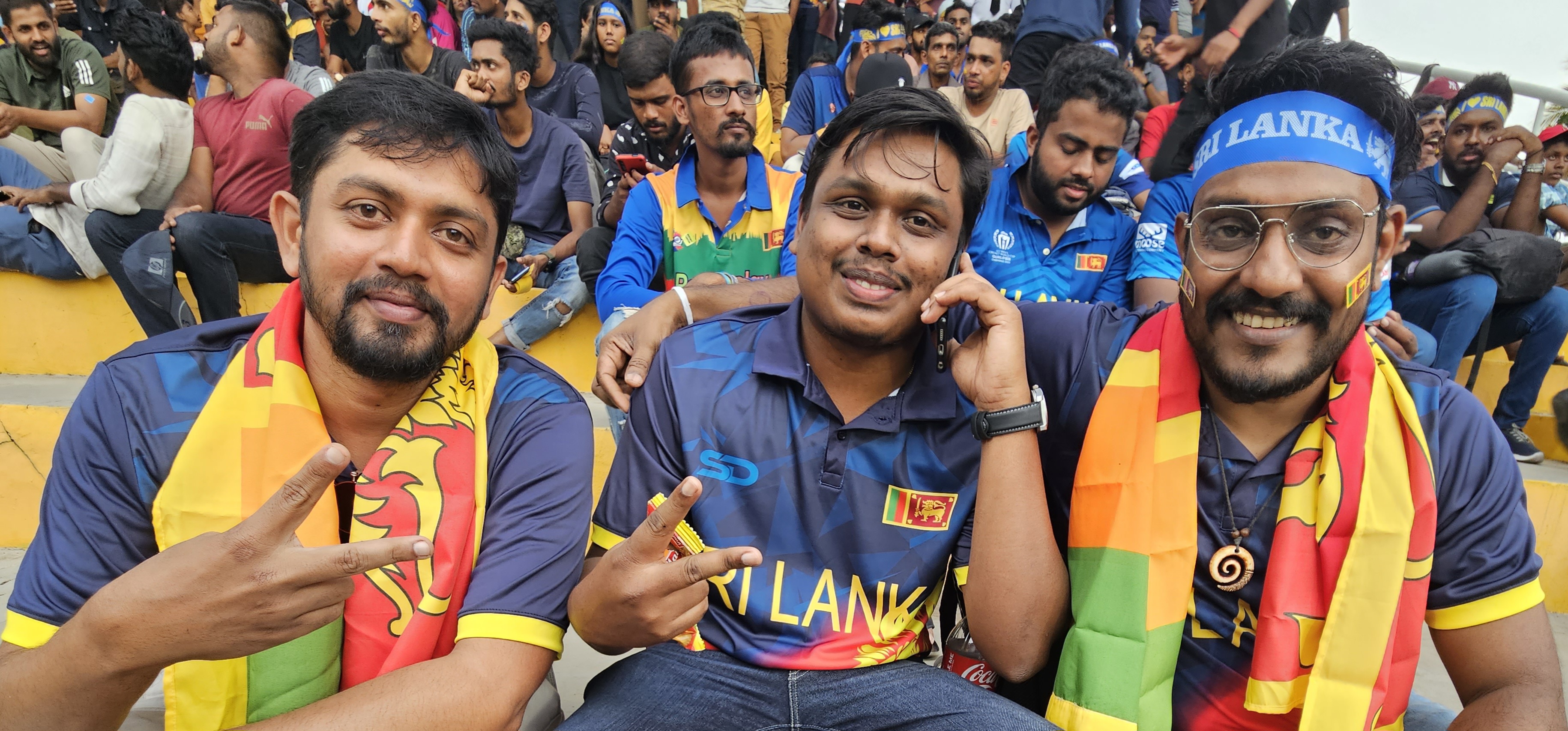 Sri Lankan cricket fans (left to right) Ruchira Mahadev, Pathum Chathura, Ishan Madusanka