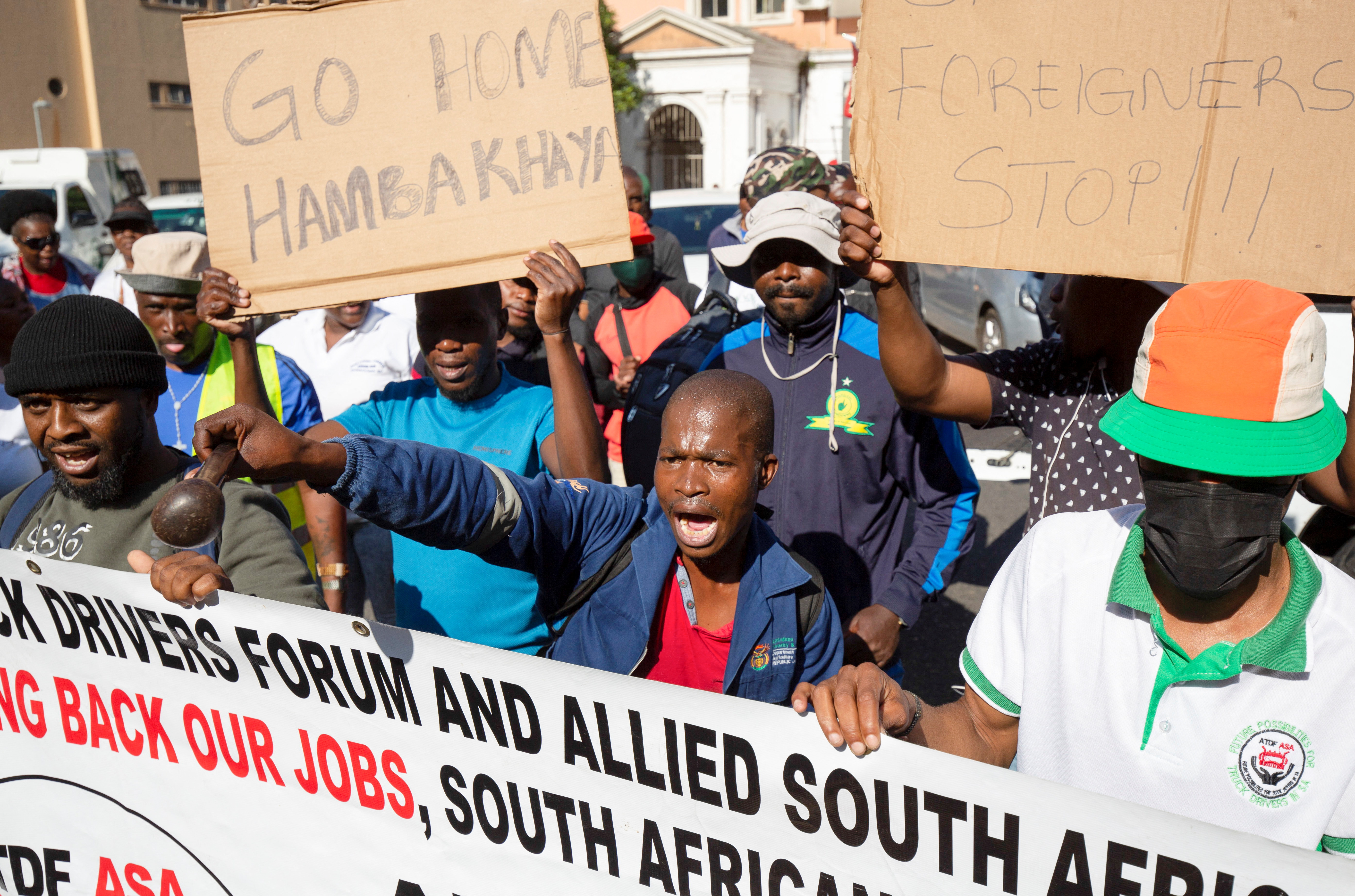 Members of the South African anti-migrant group Operation Dudula march on the Diakonia Council of Churches offices, demanding they cease assisting undocumented African immigrants