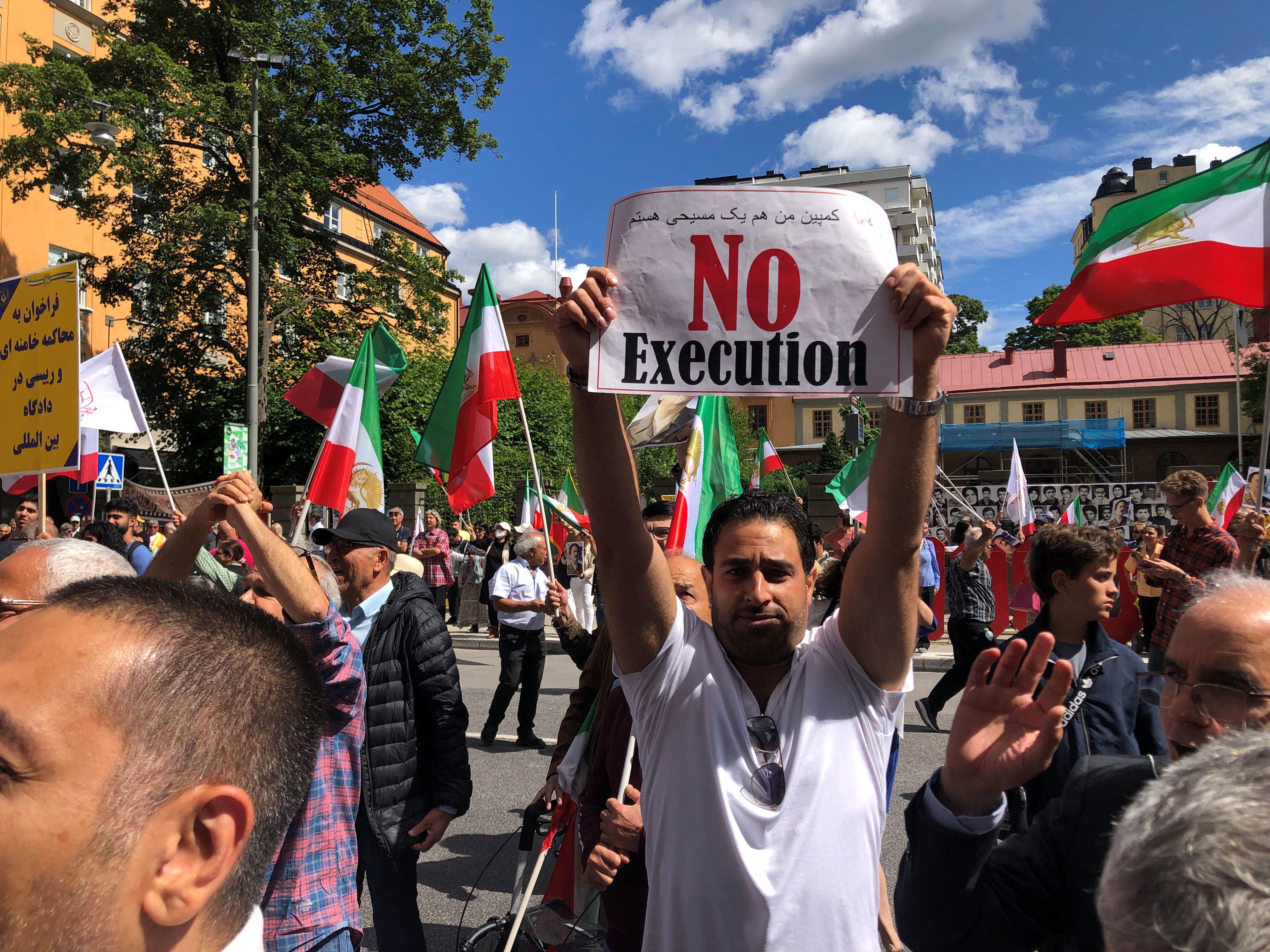 People demonstrate outside the Stockholm District Court