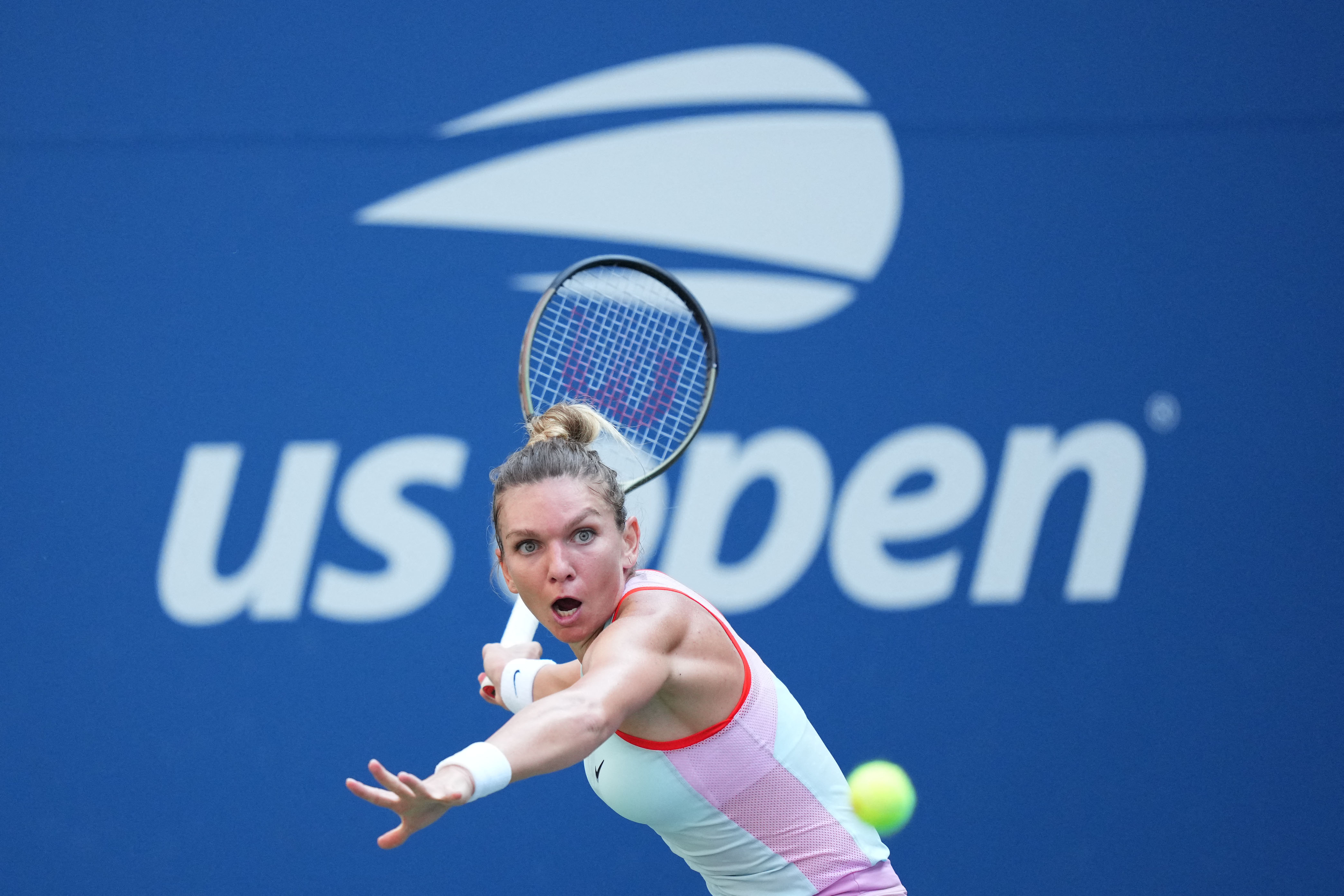 Simona Halep of Romania hits to Daria Snigur